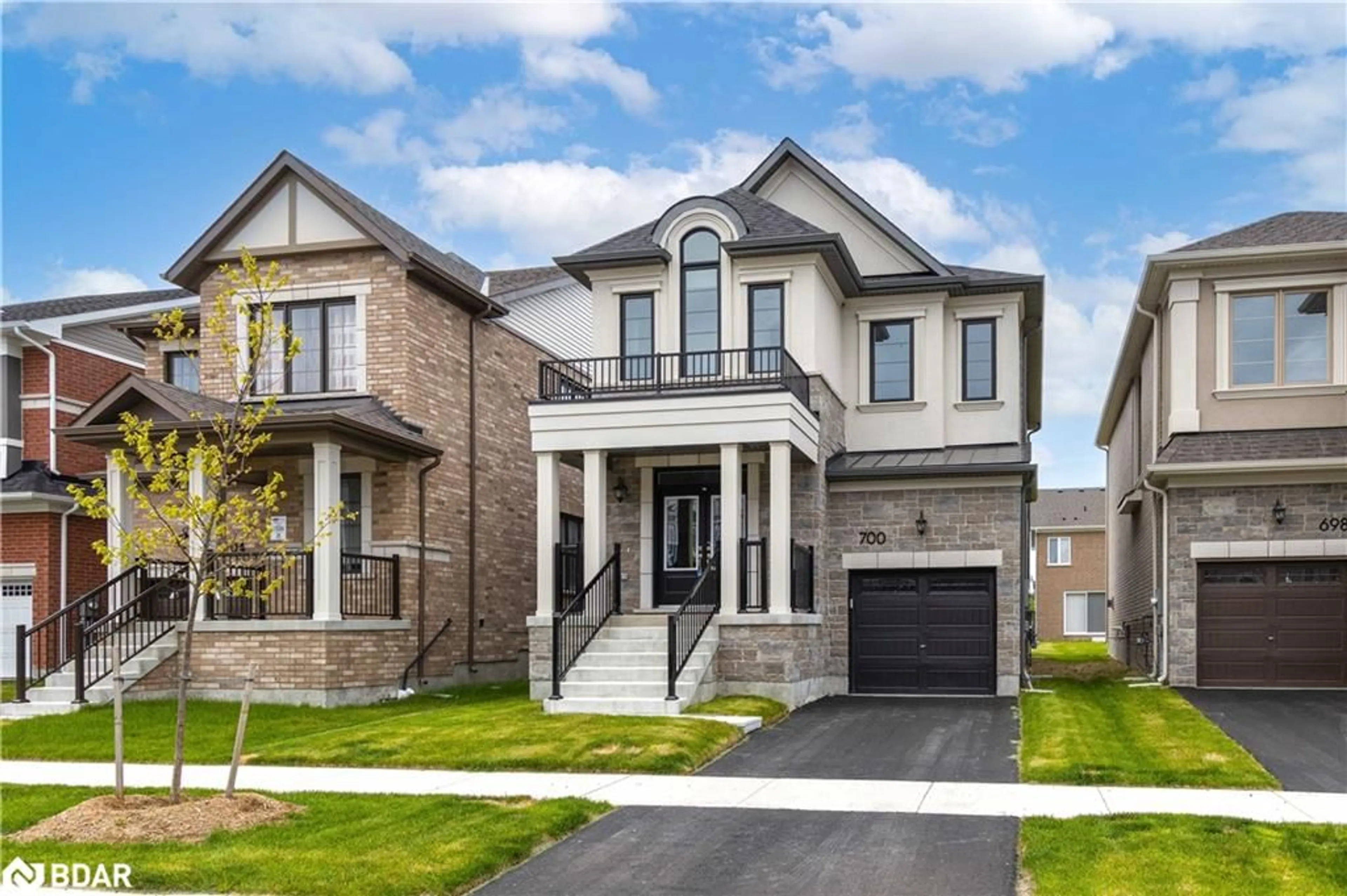 Home with brick exterior material, street for 700 Mika Street, Innisfil Ontario L9S 0R7