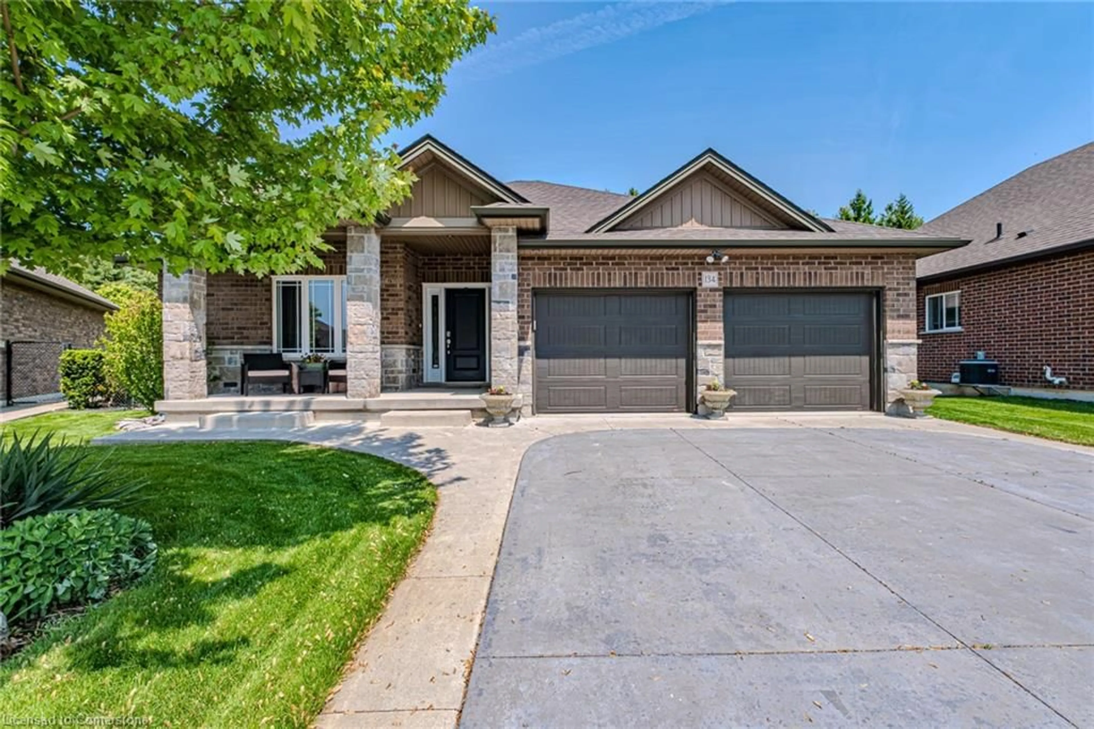 Home with brick exterior material, street for 134 Angler Ave, Port Dover Ontario N0A 1N3