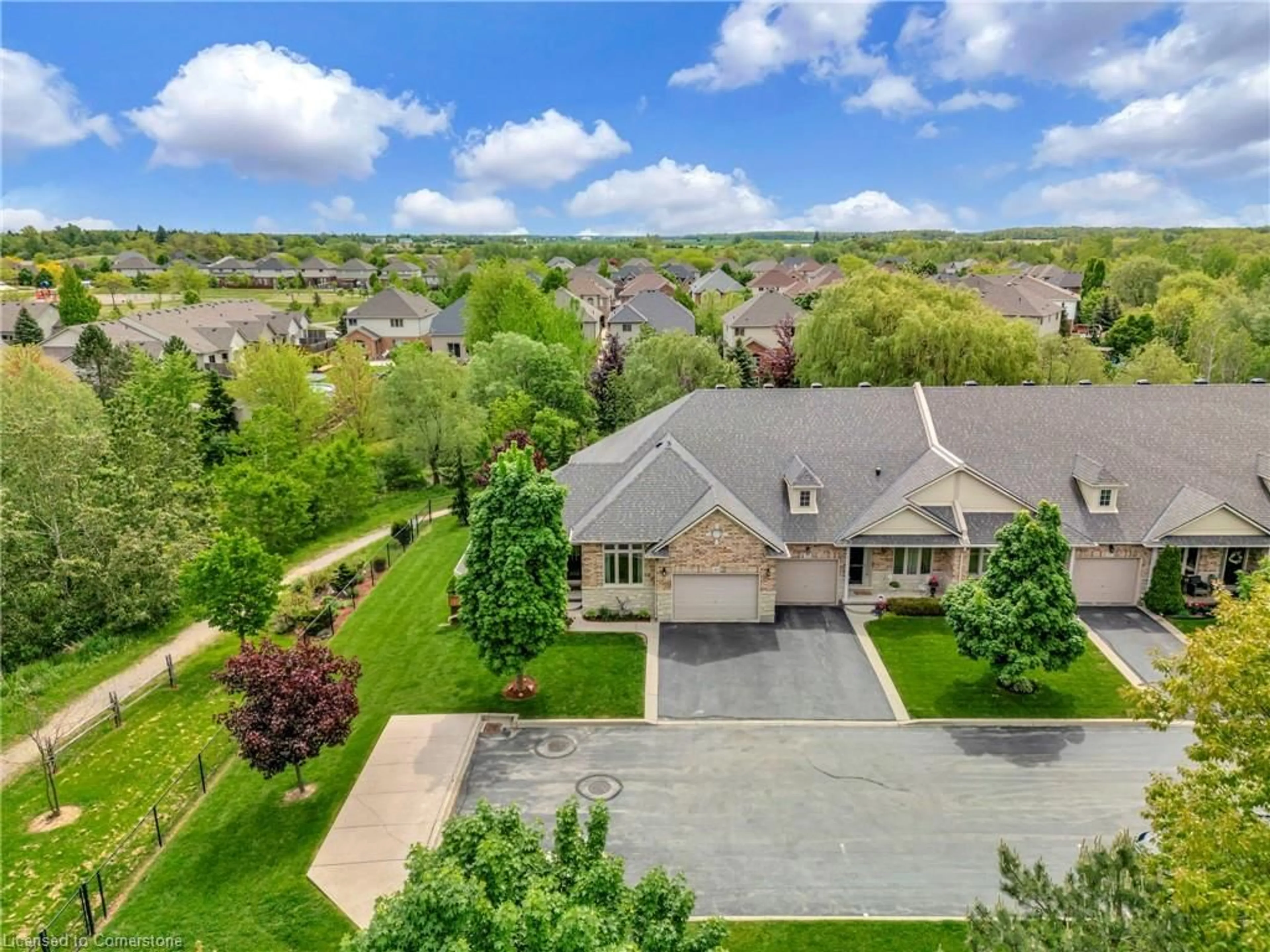 A pic from outside/outdoor area/front of a property/back of a property/a pic from drone, street for 310 Southbrook Dr #10, Binbrook Ontario L0R 1C0