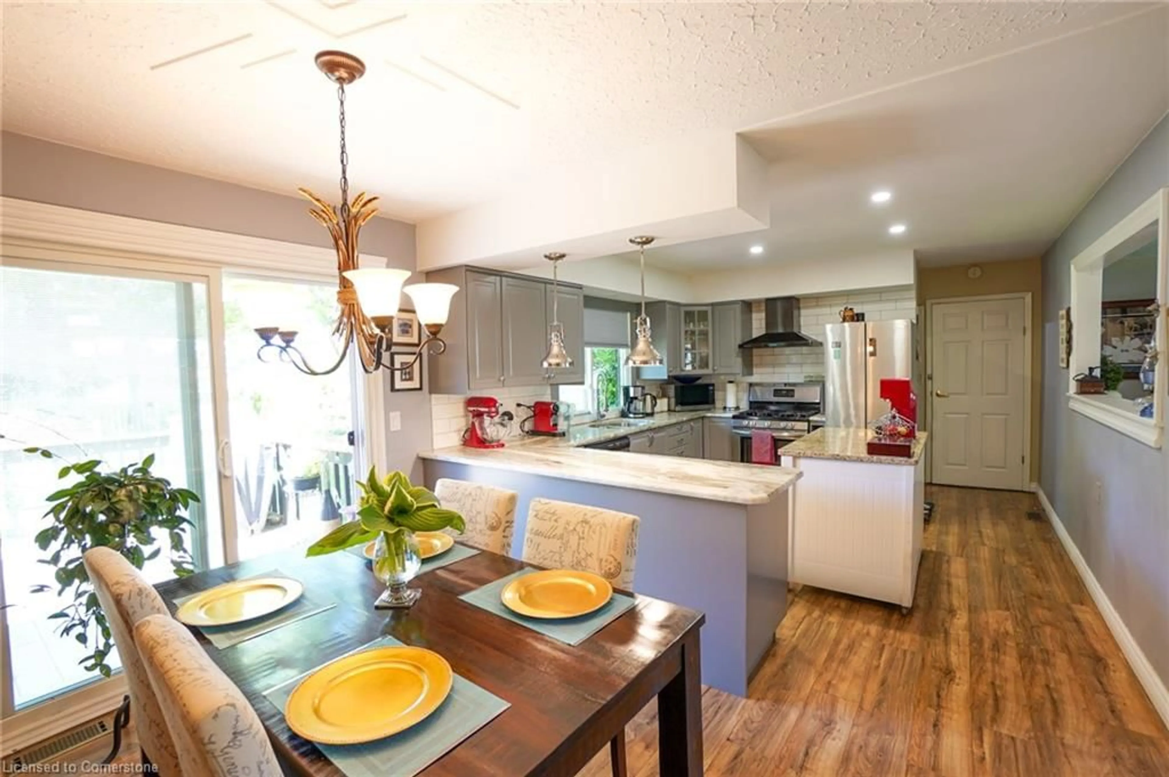Open concept kitchen, wood/laminate floor for 961 Hale St, Stoney Point Ontario N0R 1N0