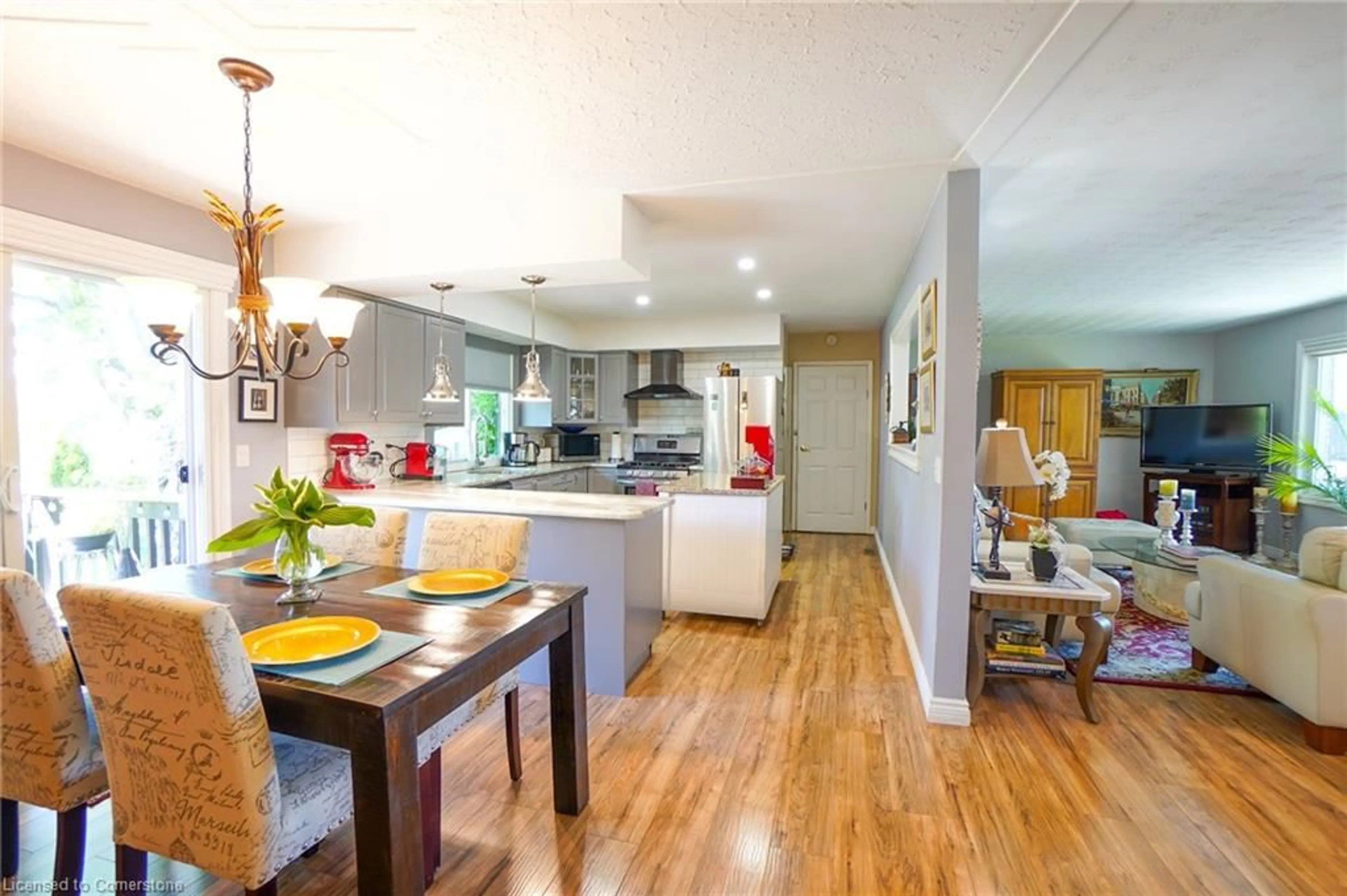 Open concept kitchen, wood/laminate floor for 961 Hale St, Stoney Point Ontario N0R 1N0