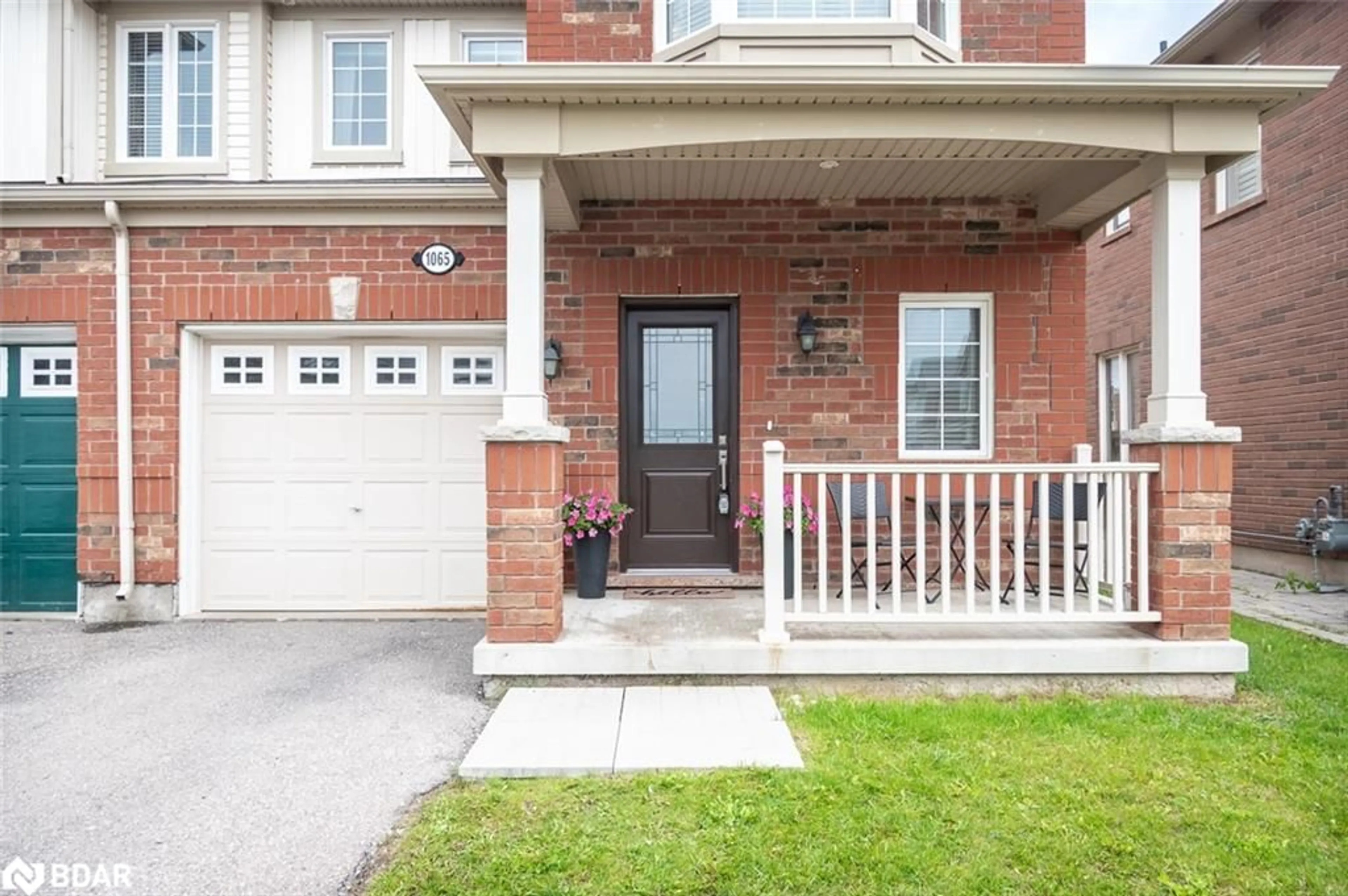 Home with brick exterior material, street for 1065 Nadalin Hts, Milton Ontario L9T 8H4