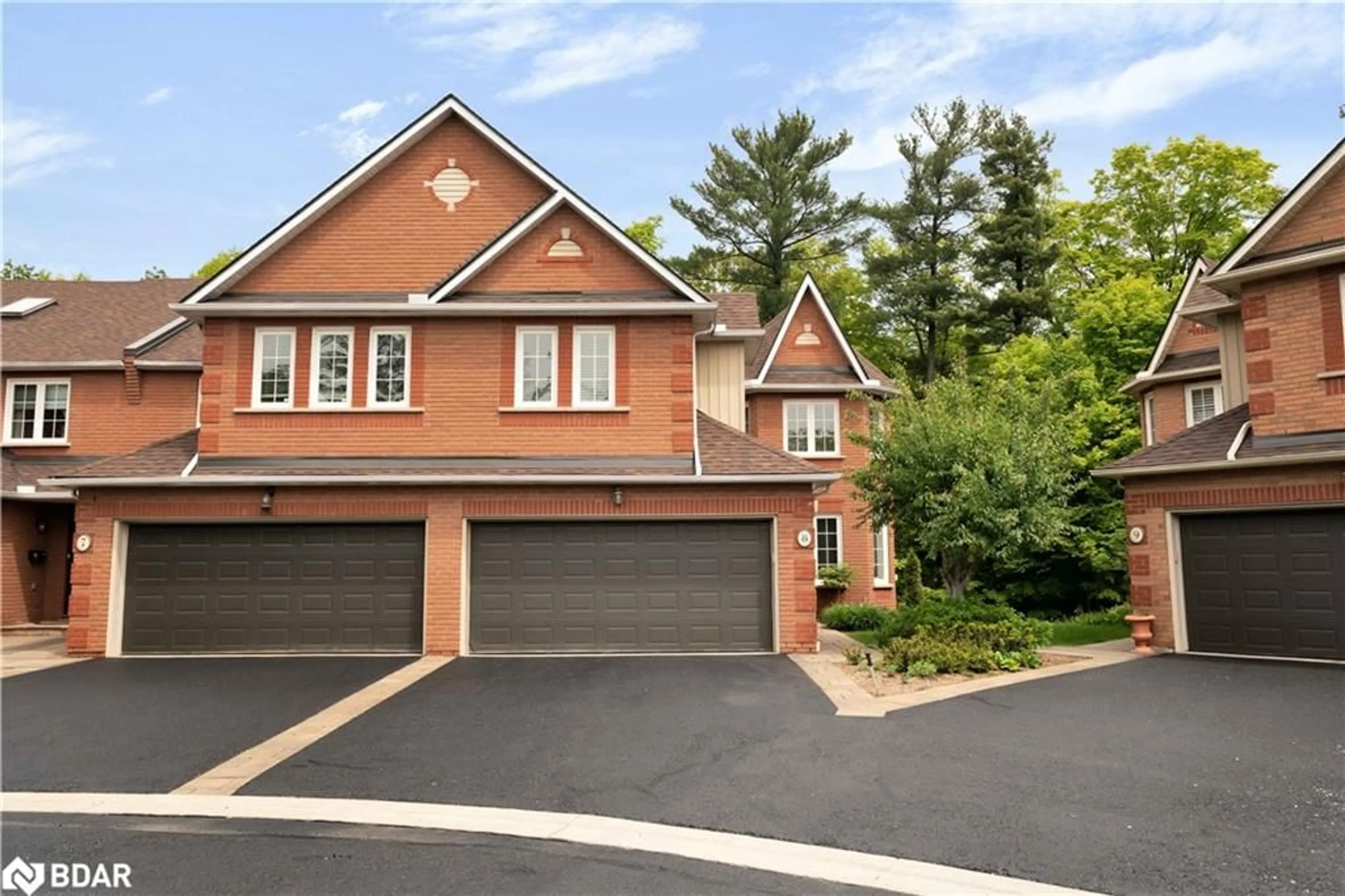 Home with brick exterior material, street for 1735 The Collegeway #8, Mississauga Ontario L5L 3S7