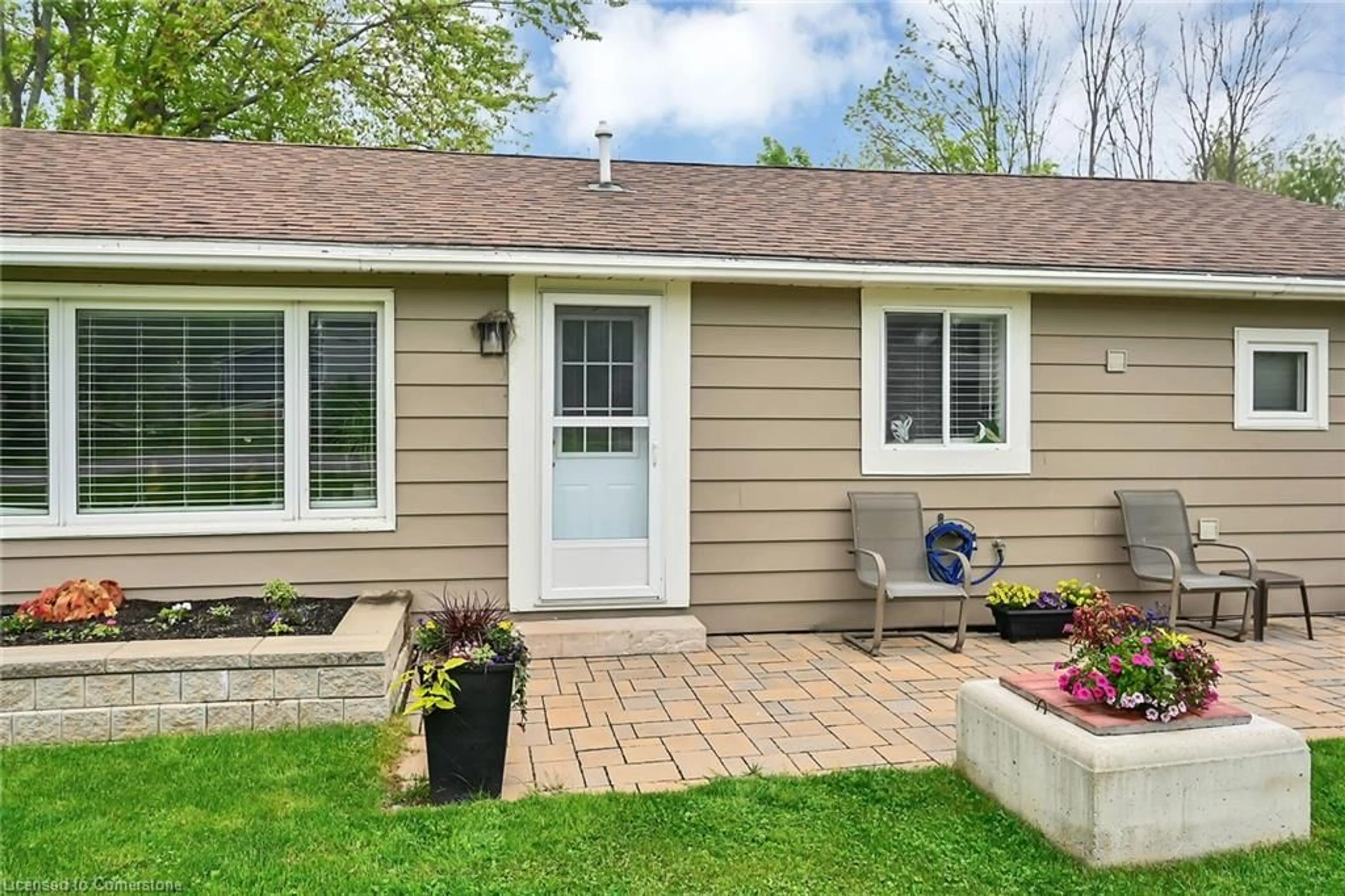 Home with vinyl exterior material, street for 12 Witherspoon Dr, Peacock Point Ontario N0A 1L0