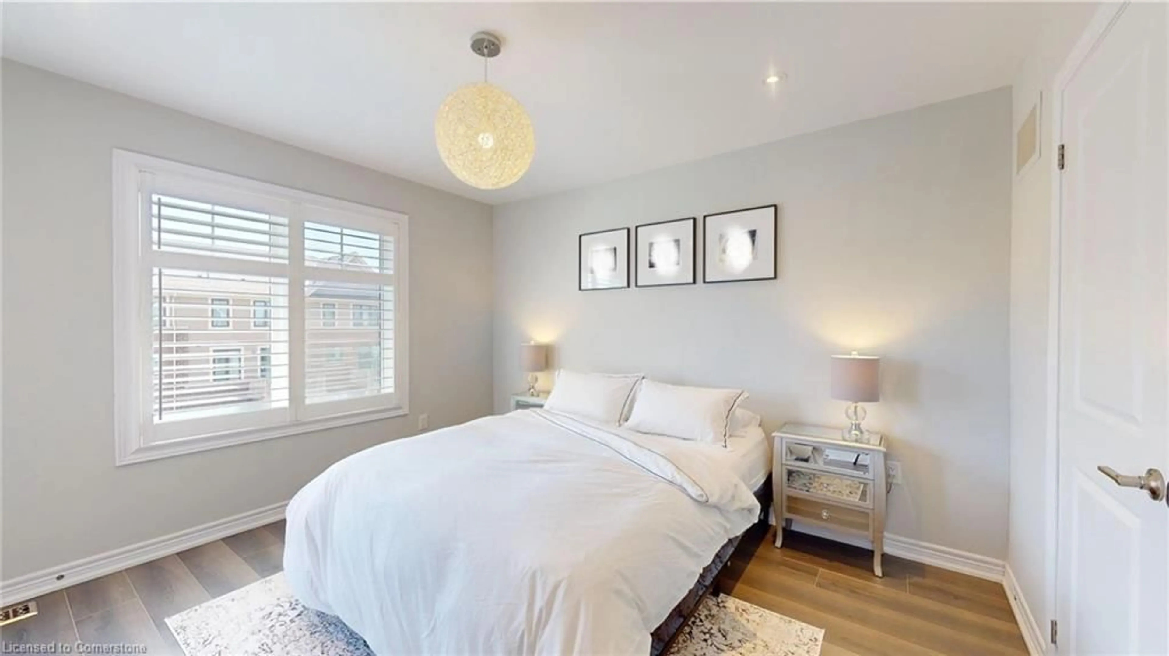 Bedroom with bed, wood/laminate floor for 288 Glover Rd #27, Stoney Creek Ontario L8E 5H6