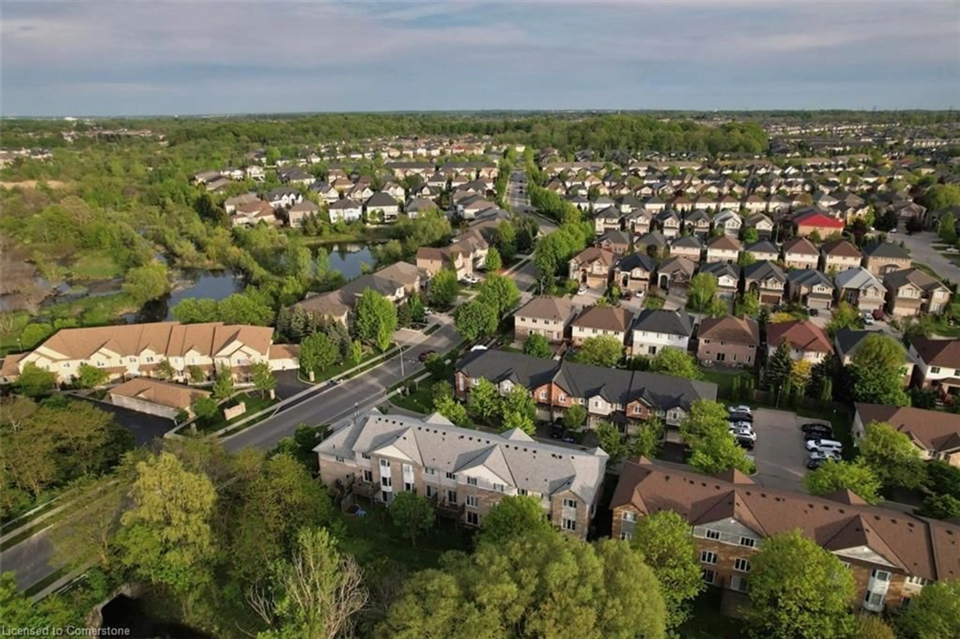 A pic from outside/outdoor area/front of a property/back of a property/a pic from drone, street for 60 Cloverleaf Dr #48, Ancaster Ontario L9K 1S8