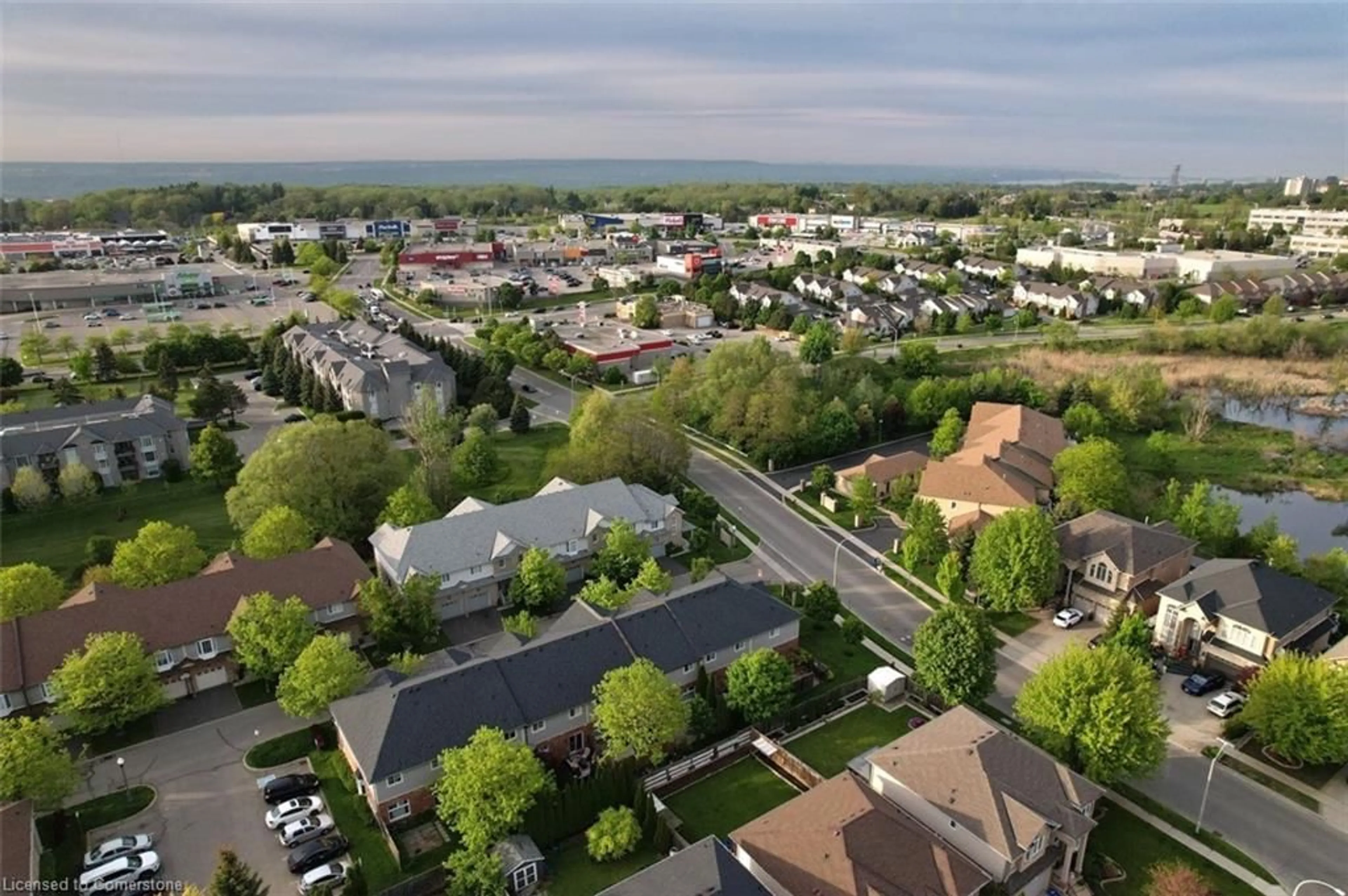 A pic from outside/outdoor area/front of a property/back of a property/a pic from drone, street for 60 Cloverleaf Dr #48, Ancaster Ontario L9K 1S8