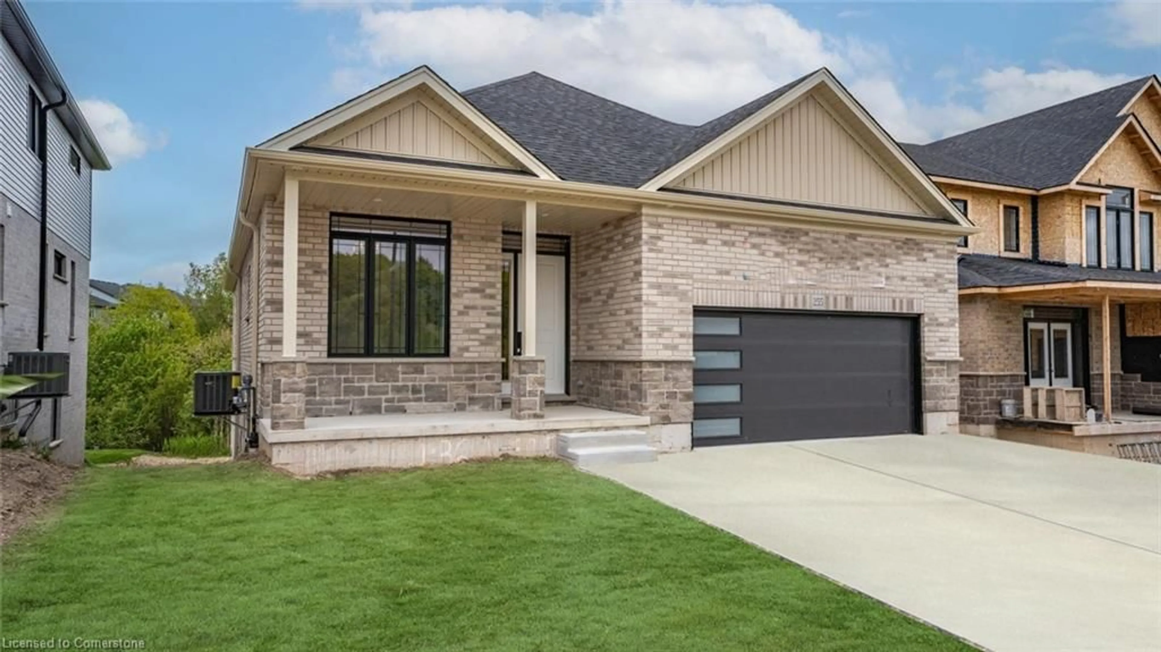 Home with brick exterior material, street for 255 Ladyslipper Dr, Waterloo Ontario N2V 0C3