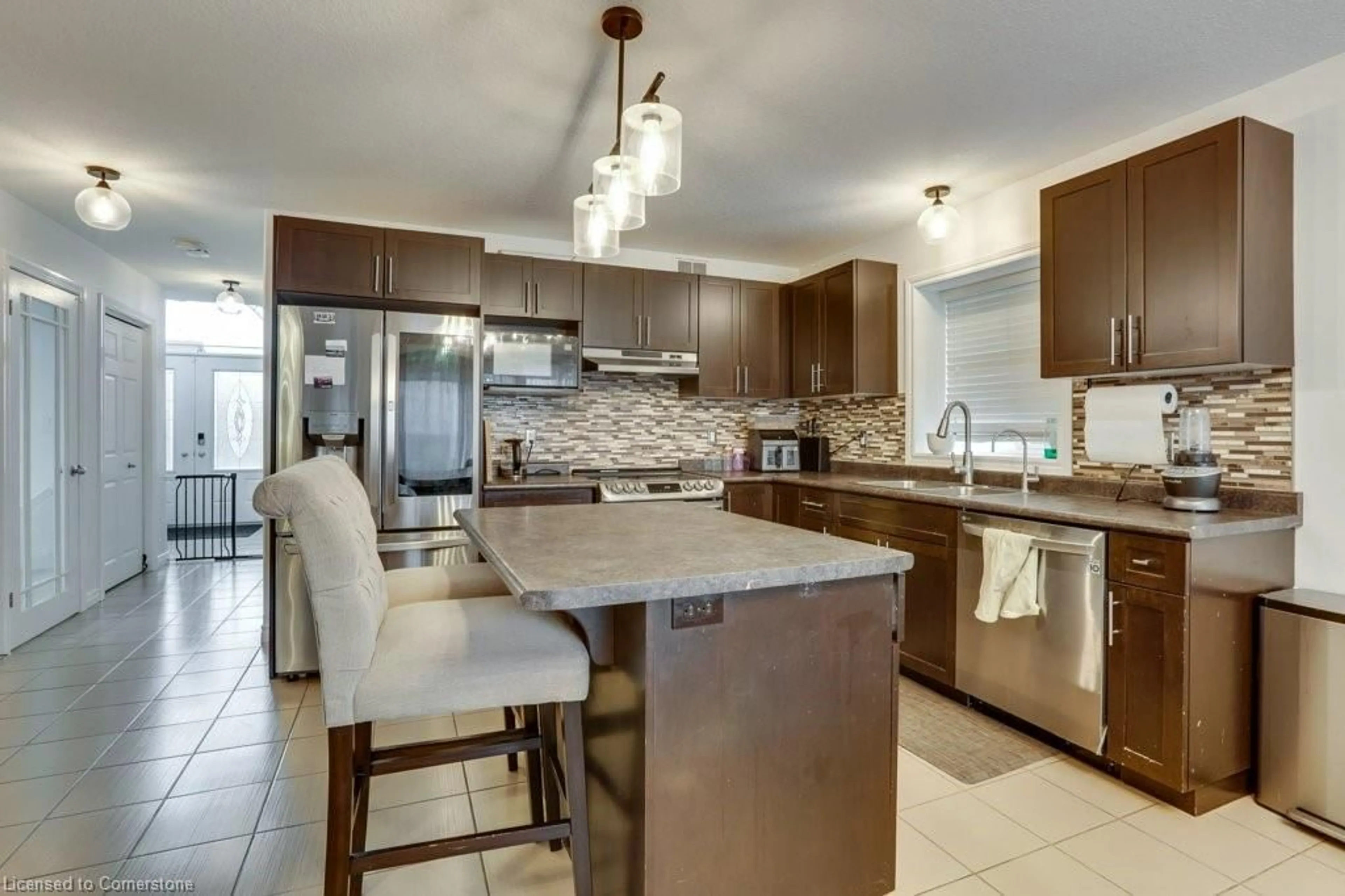 Open concept kitchen, ceramic/tile floor for 153 Winders Trail, Ingersoll Ontario N5C 0A7