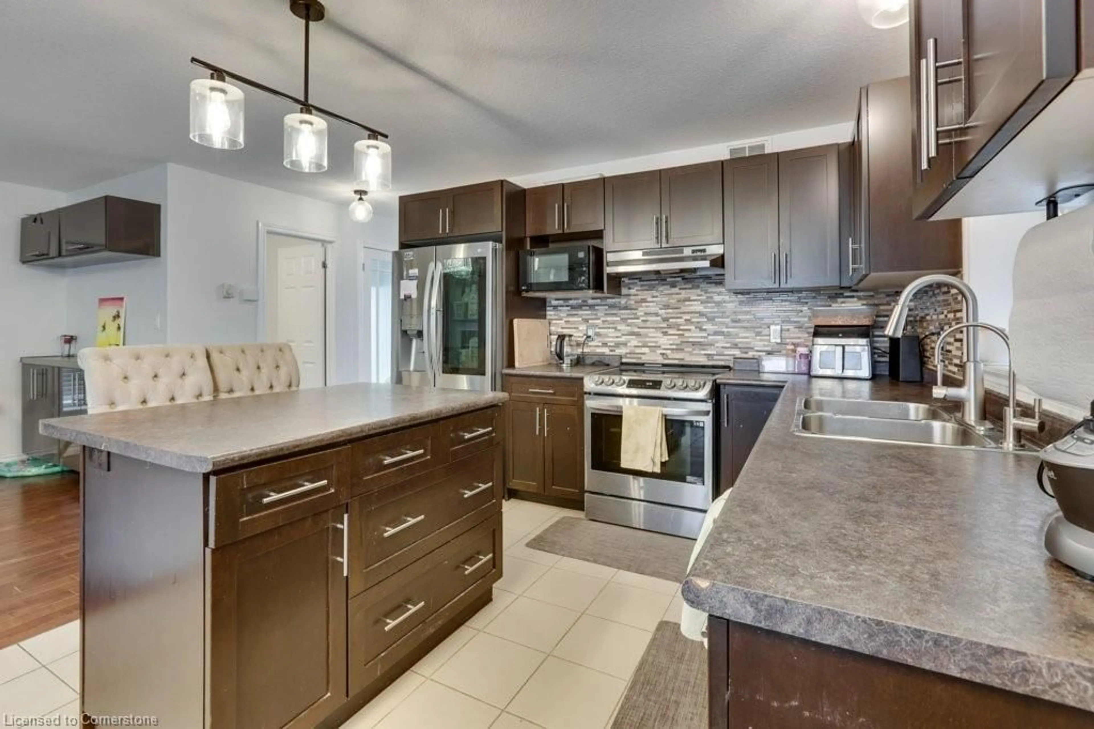 Open concept kitchen, ceramic/tile floor for 153 Winders Trail, Ingersoll Ontario N5C 0A7