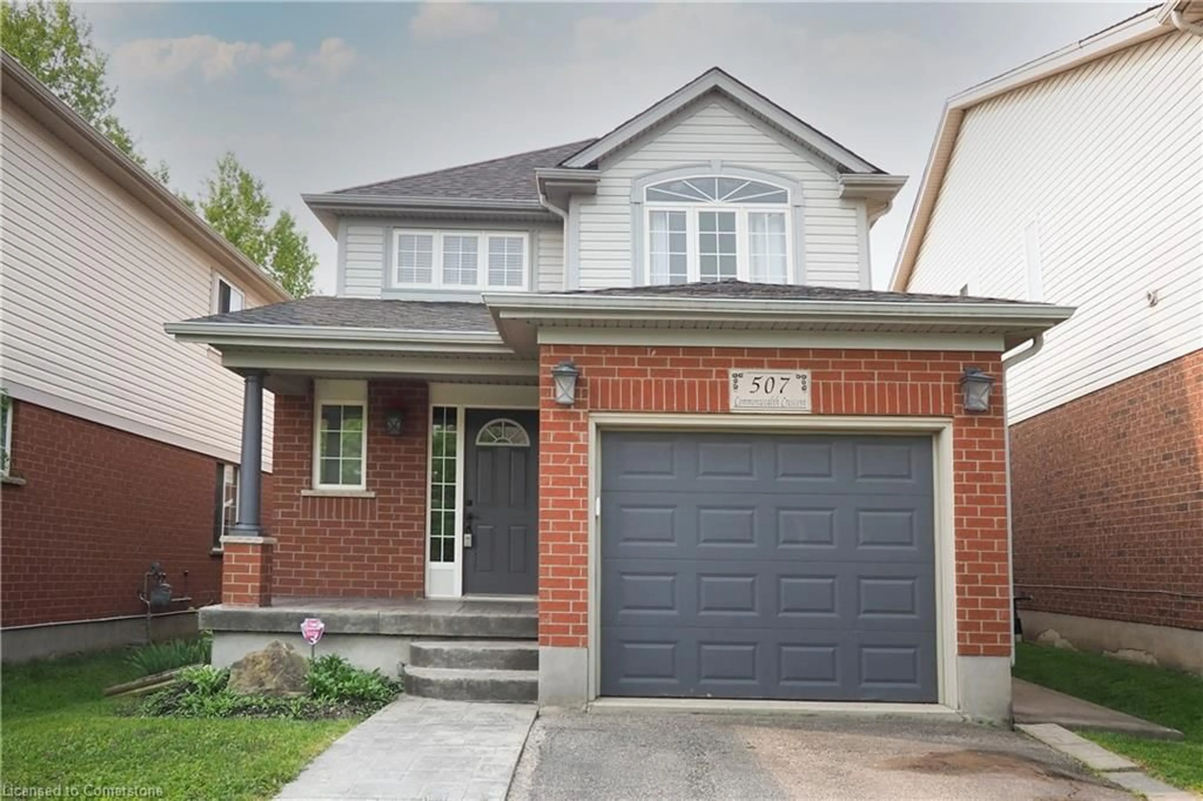 Home with brick exterior material, street for 507 Commonwealth Cres, Kitchener Ontario N2E 4K2