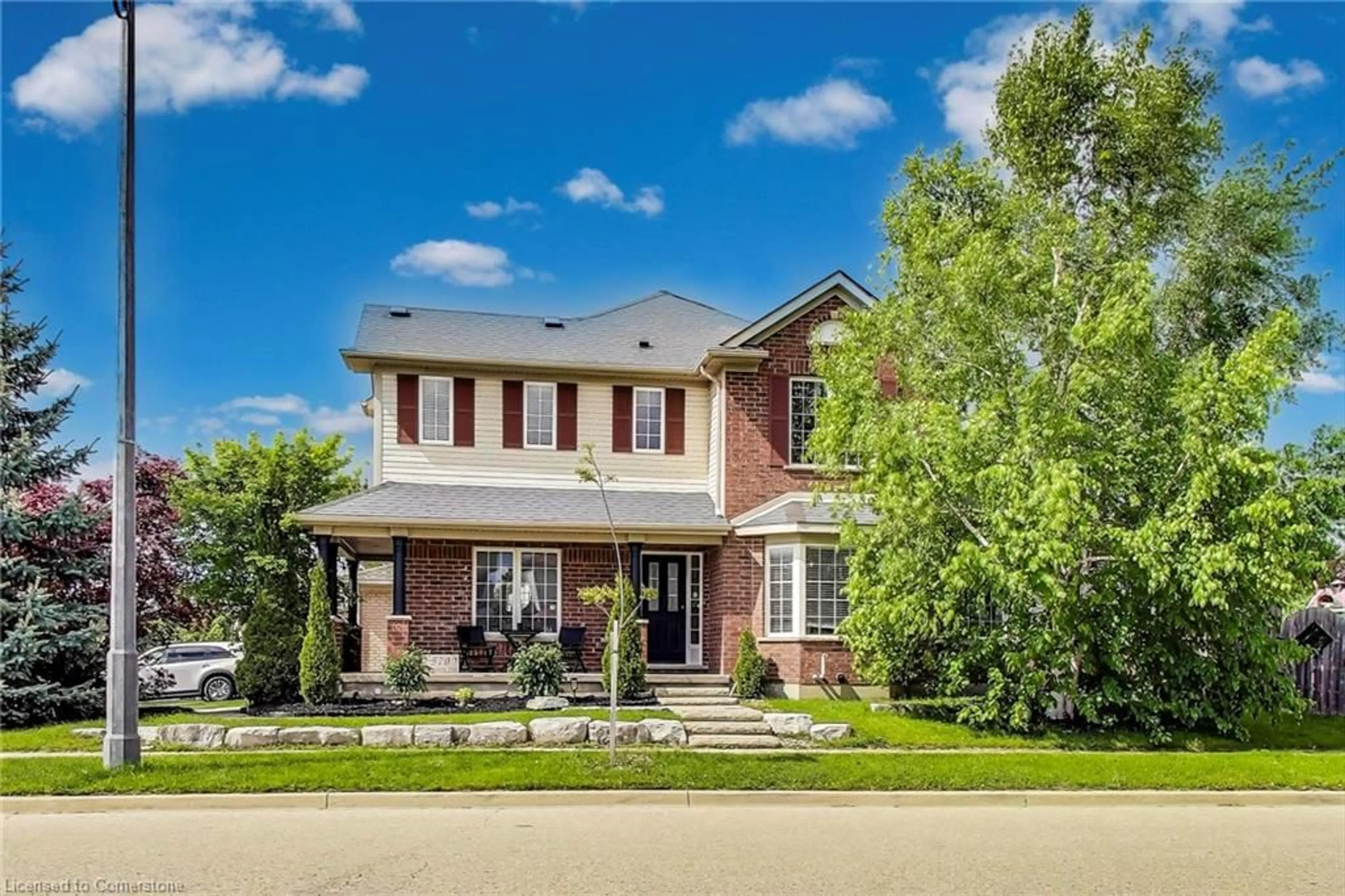 Home with brick exterior material, street for 570 New Bedford Dr, Waterloo Ontario N2K 4M7