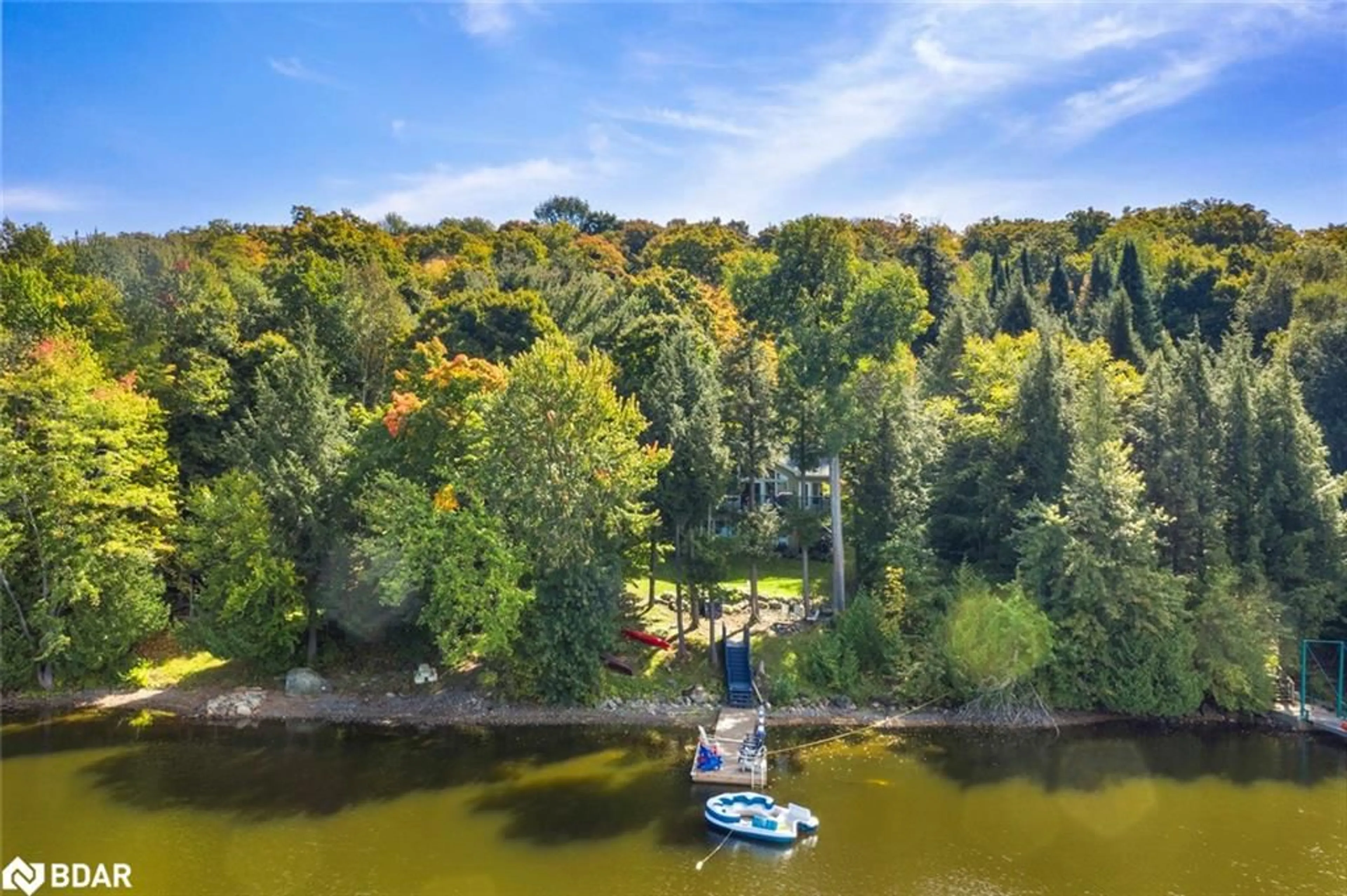 A pic from outside/outdoor area/front of a property/back of a property/a pic from drone, water/lake/river/ocean view for 1202 Windermere Rd #12, Windermere Ontario P0B 1M0