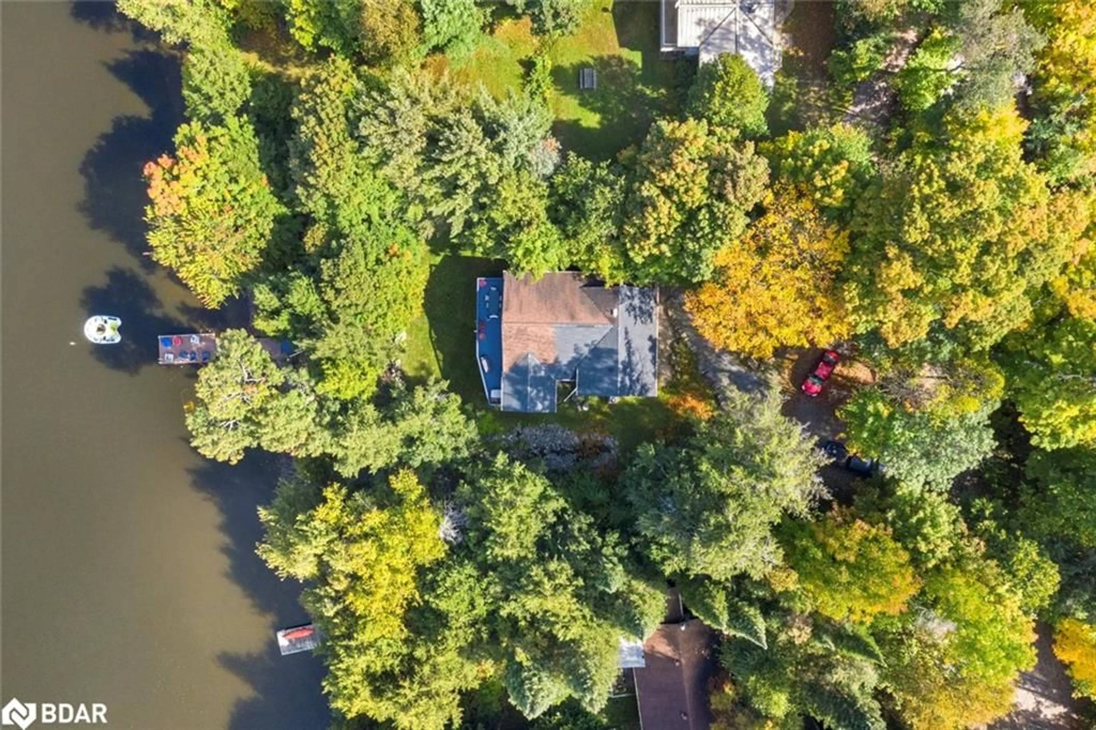 A pic from outside/outdoor area/front of a property/back of a property/a pic from drone, water/lake/river/ocean view for 1202 Windermere Rd #12, Windermere Ontario P0B 1M0