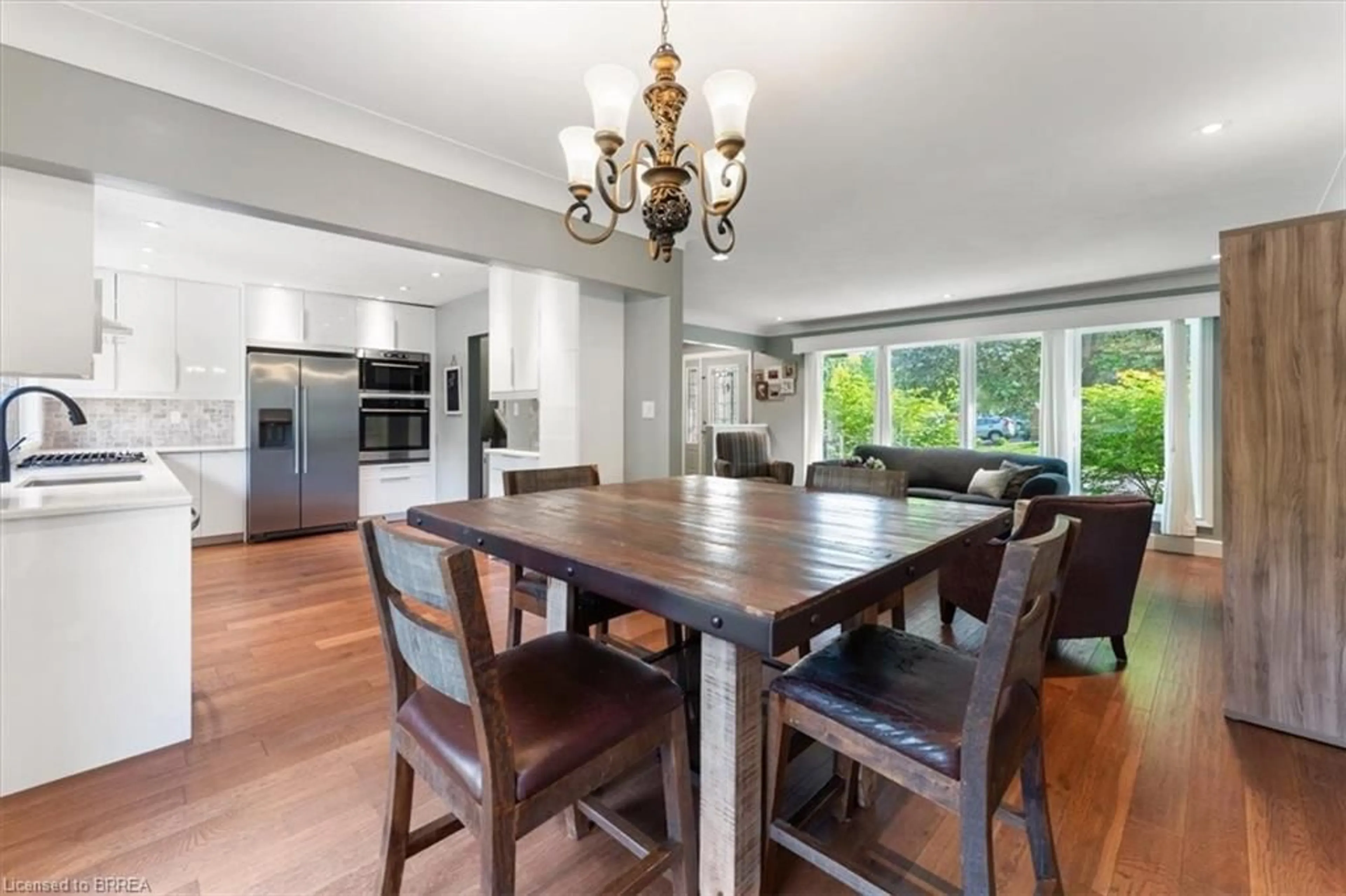 Open concept kitchen, wood/laminate floor for 3 Scotia Ave, Brantford Ontario N3R 5P9