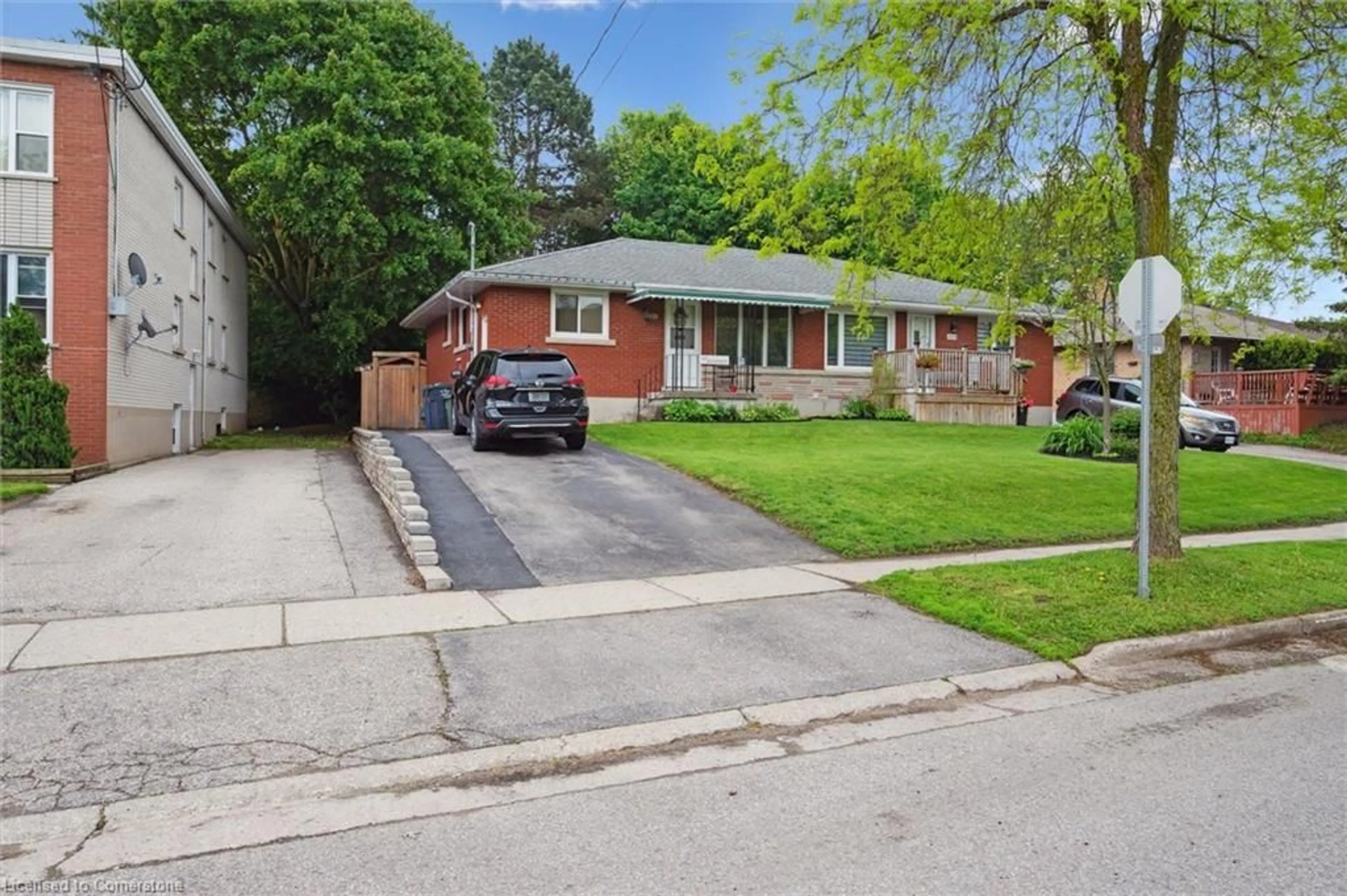 Home with brick exterior material, street for 131 Waverley Dr, Guelph Ontario N1E 1H1