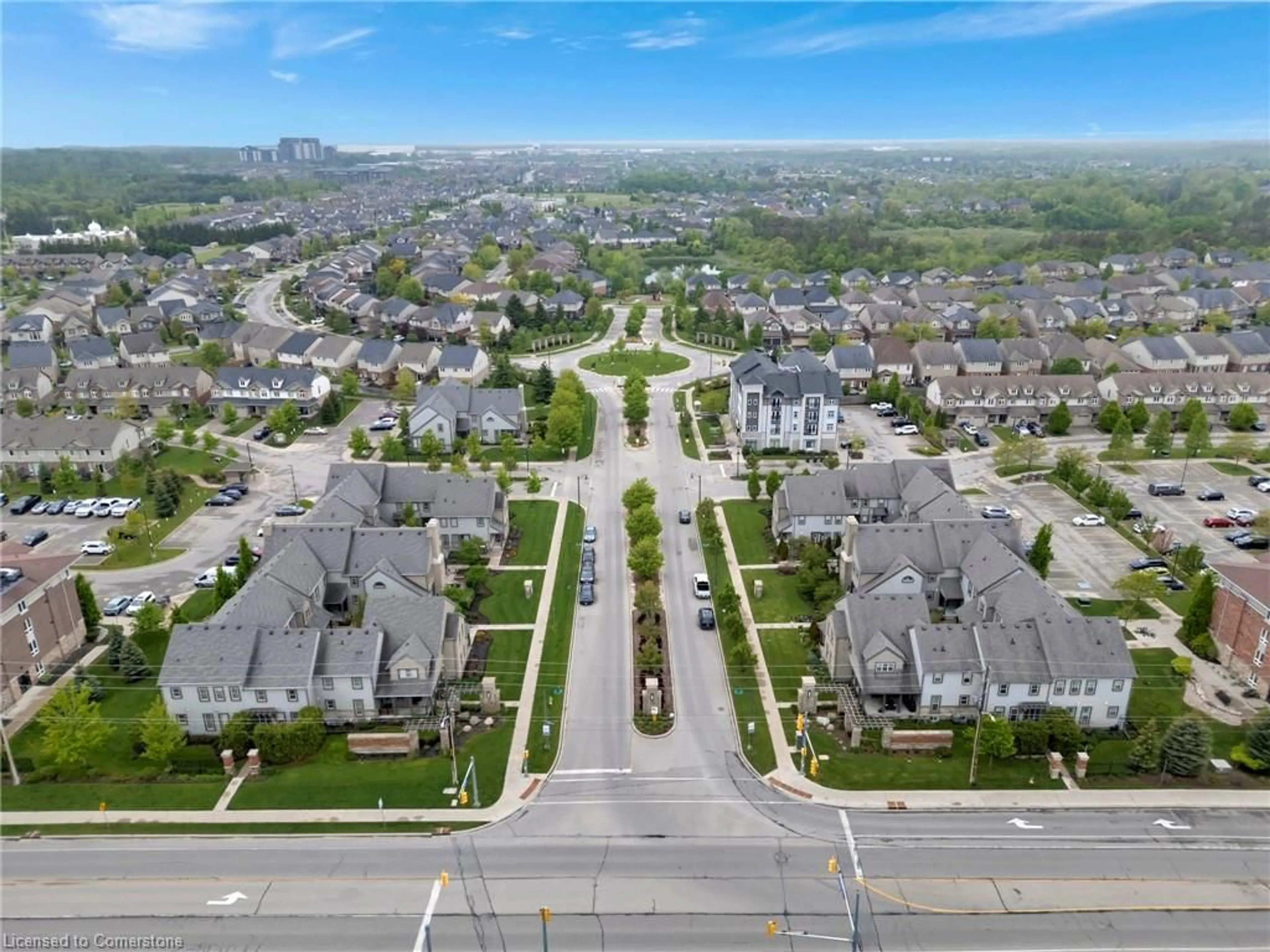 A pic from outside/outdoor area/front of a property/back of a property/a pic from drone, street for 101 Frederick Dr #13, Guelph Ontario N1L 0K7