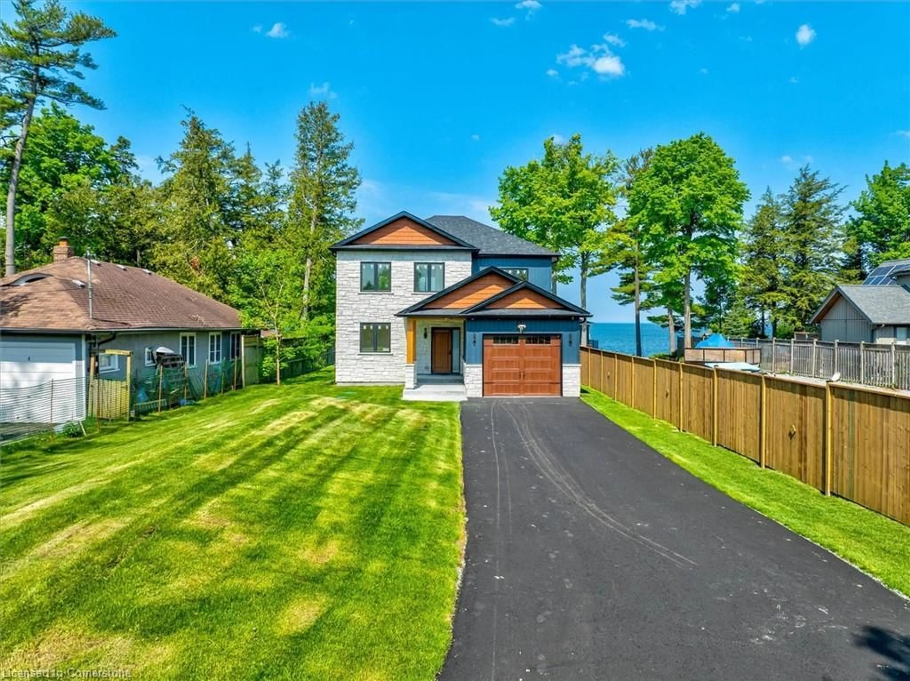A pic from outside/outdoor area/front of a property/back of a property/a pic from drone, water/lake/river/ocean view for 24410 Thorah Park Blvd, Beaverton Ontario L0K 1A0