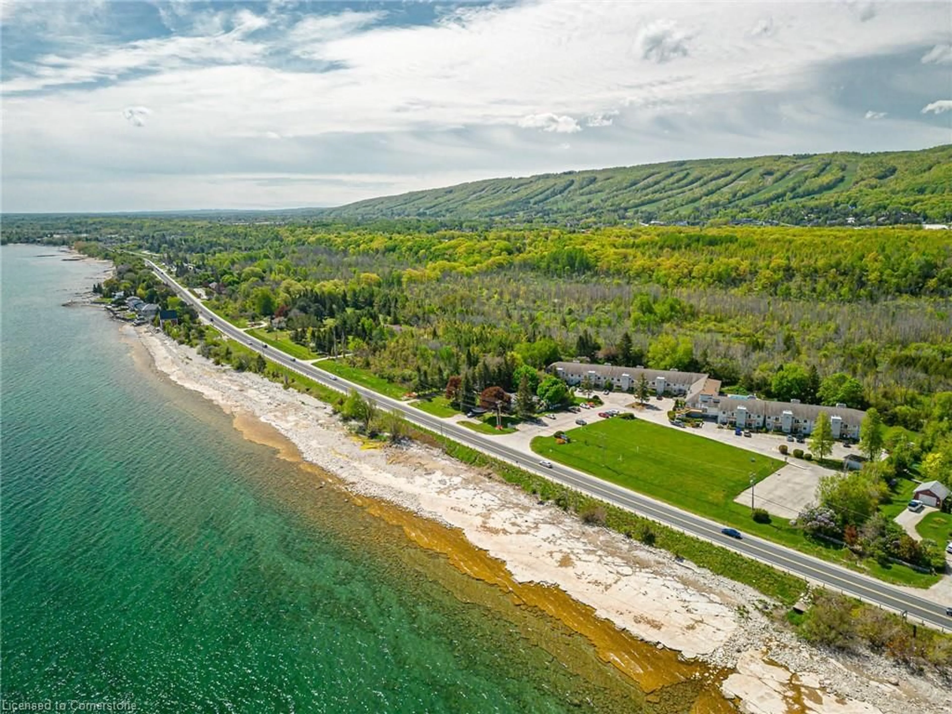 A pic from outside/outdoor area/front of a property/back of a property/a pic from drone, water/lake/river/ocean view for 209472 26 Hwy #19, The Blue Mountains Ontario L9Y 0V3