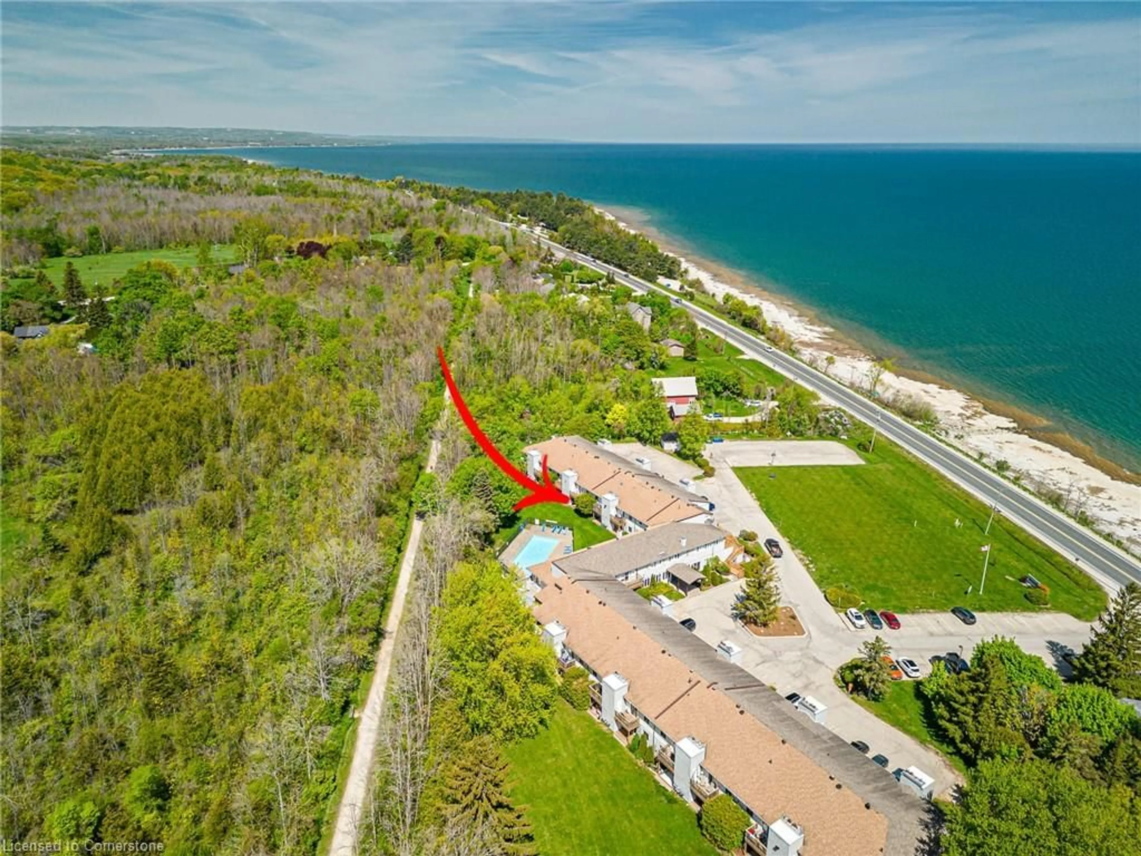 A pic from outside/outdoor area/front of a property/back of a property/a pic from drone, water/lake/river/ocean view for 209472 26 Hwy #19, The Blue Mountains Ontario L9Y 0V3