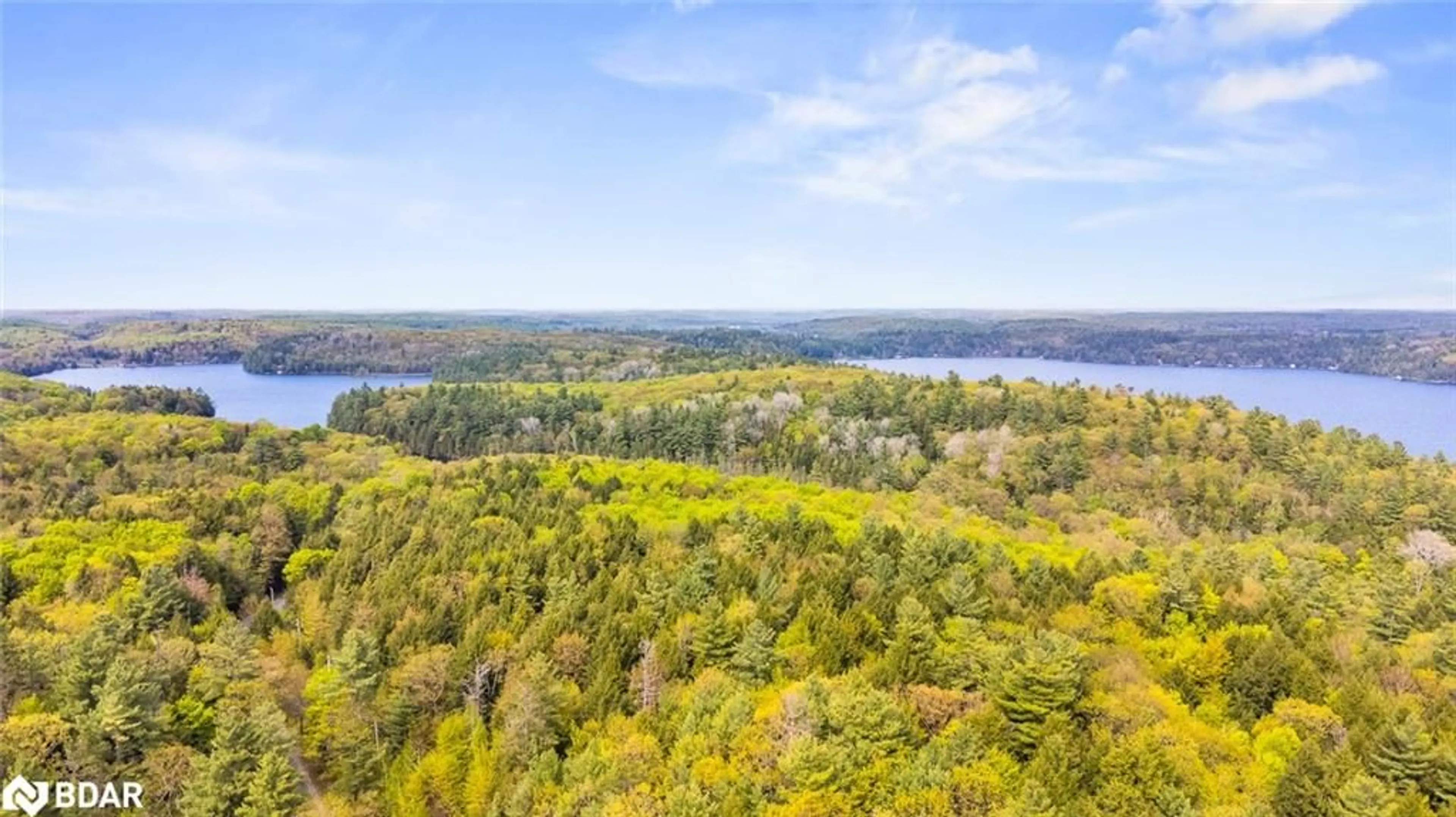 A pic from outside/outdoor area/front of a property/back of a property/a pic from drone, water/lake/river/ocean view for 1452 Rackety Trail Rd, Minden Ontario K0M 2K0