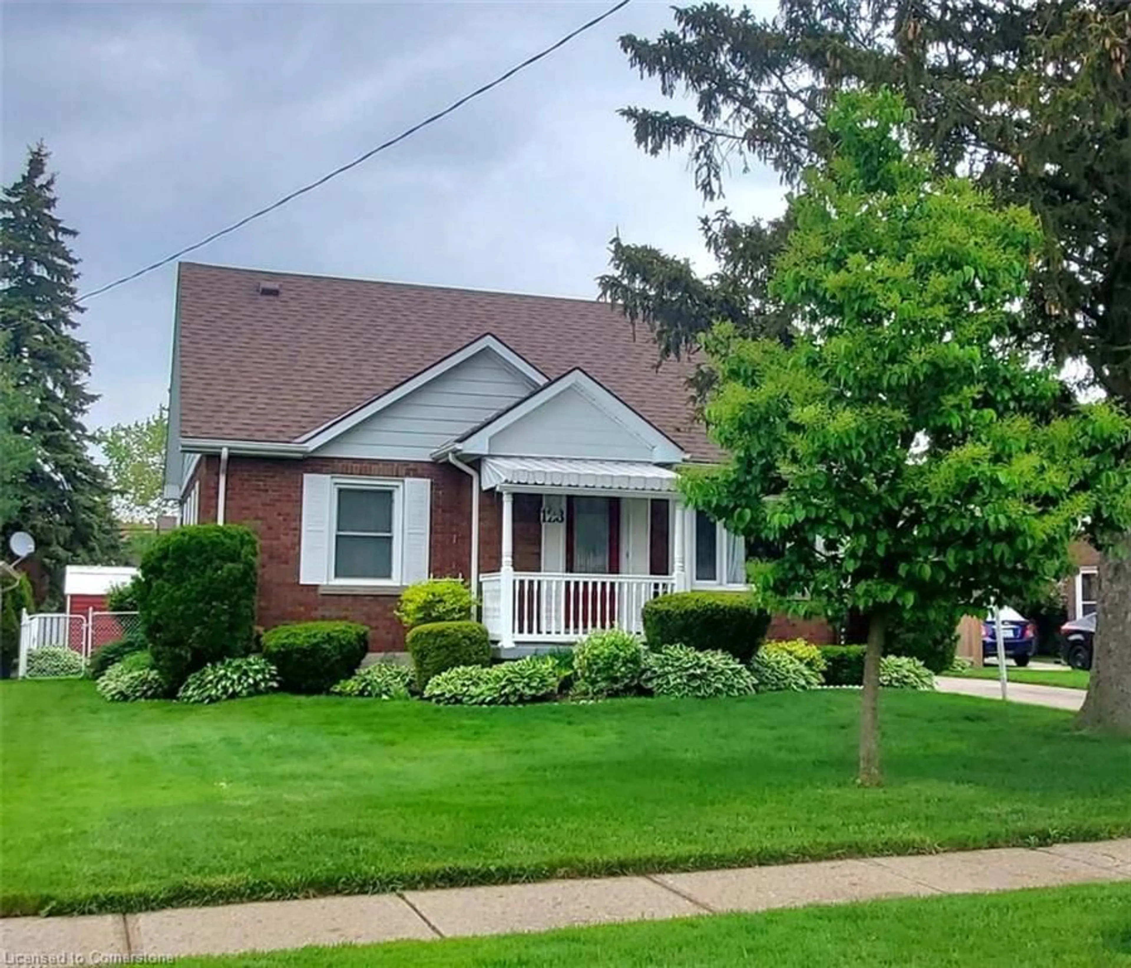 Home with brick exterior material, street for 128 Woods St, Stratford Ontario N5A 1M4