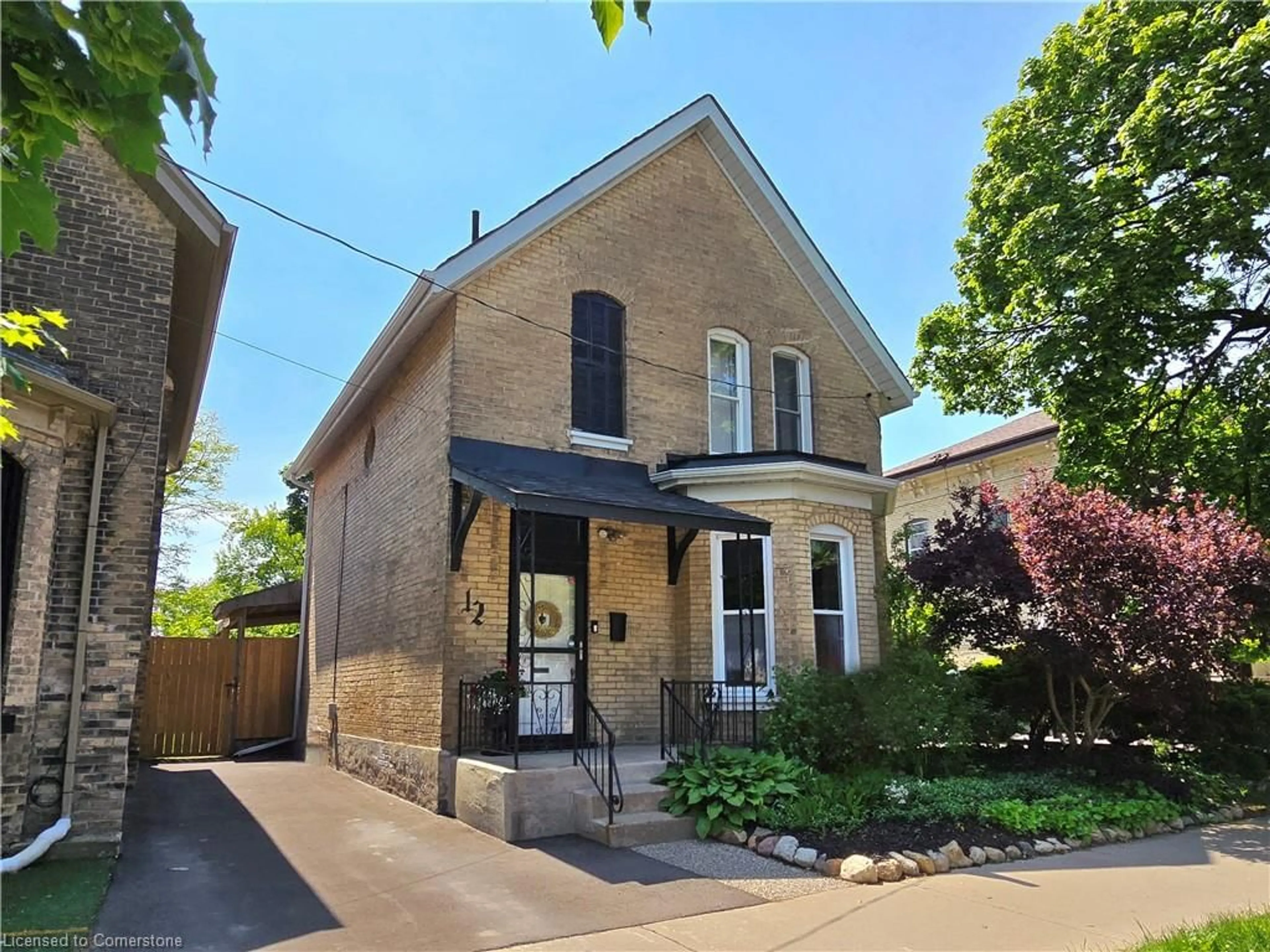 Home with brick exterior material, street for 12 Pearl St, Brantford Ontario N3T 3N4