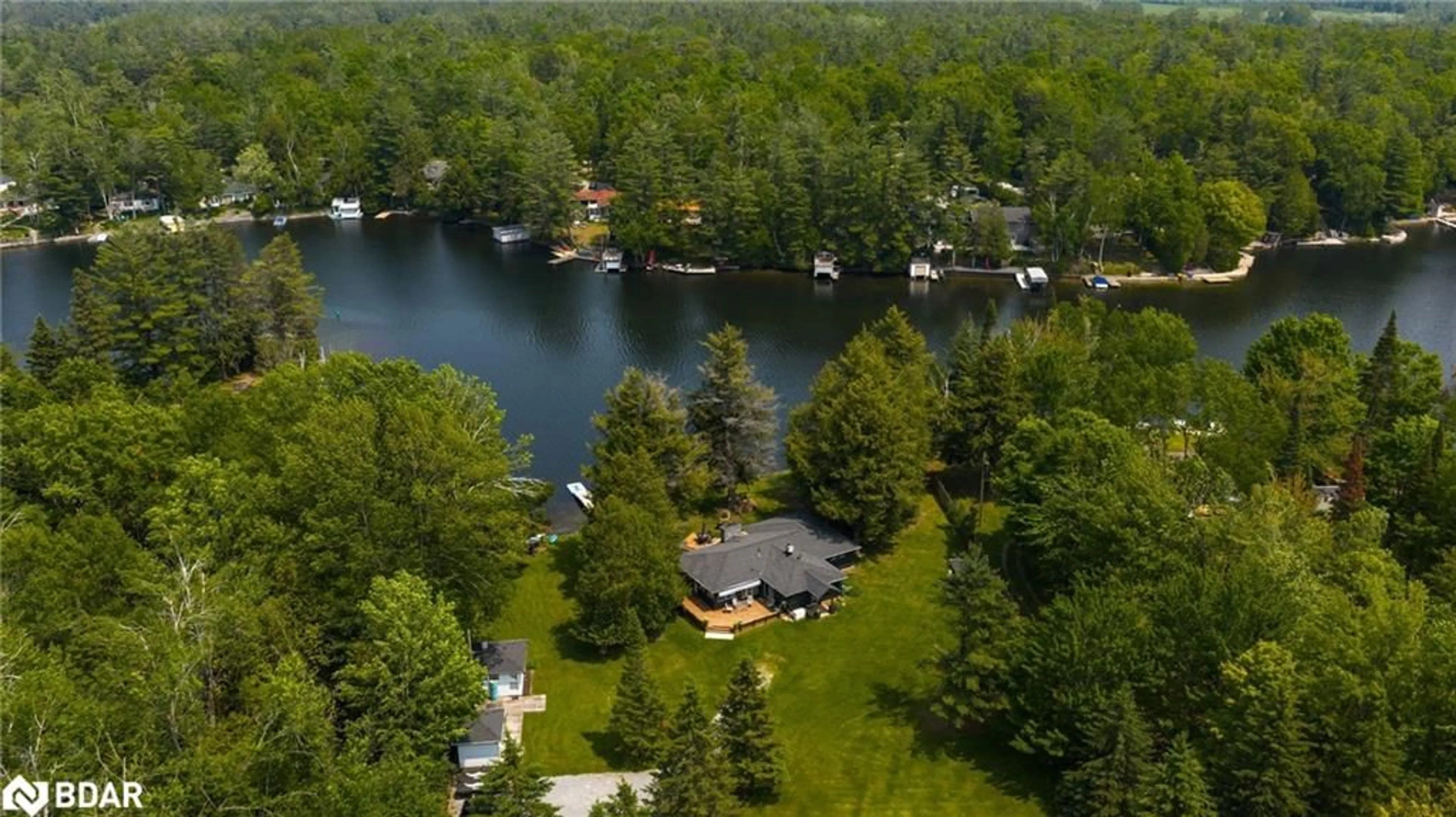 A pic from outside/outdoor area/front of a property/back of a property/a pic from drone, water/lake/river/ocean view for 22 Cardinal Dr, Woodville Ontario K0M 2T0