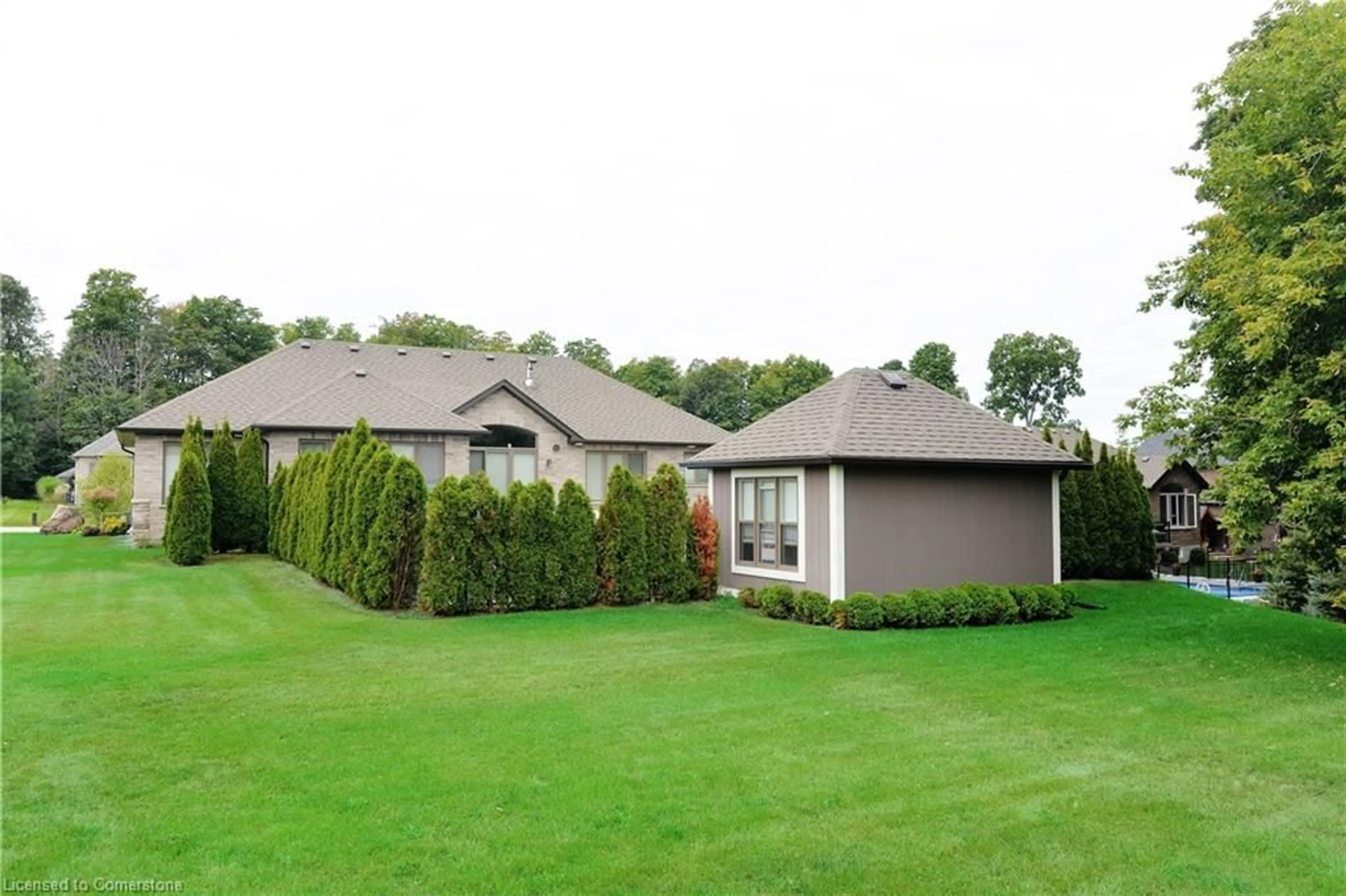 A pic from outside/outdoor area/front of a property/back of a property/a pic from drone, unknown for 9 Black Creek Trail, Springwater Ontario L9X 0J2