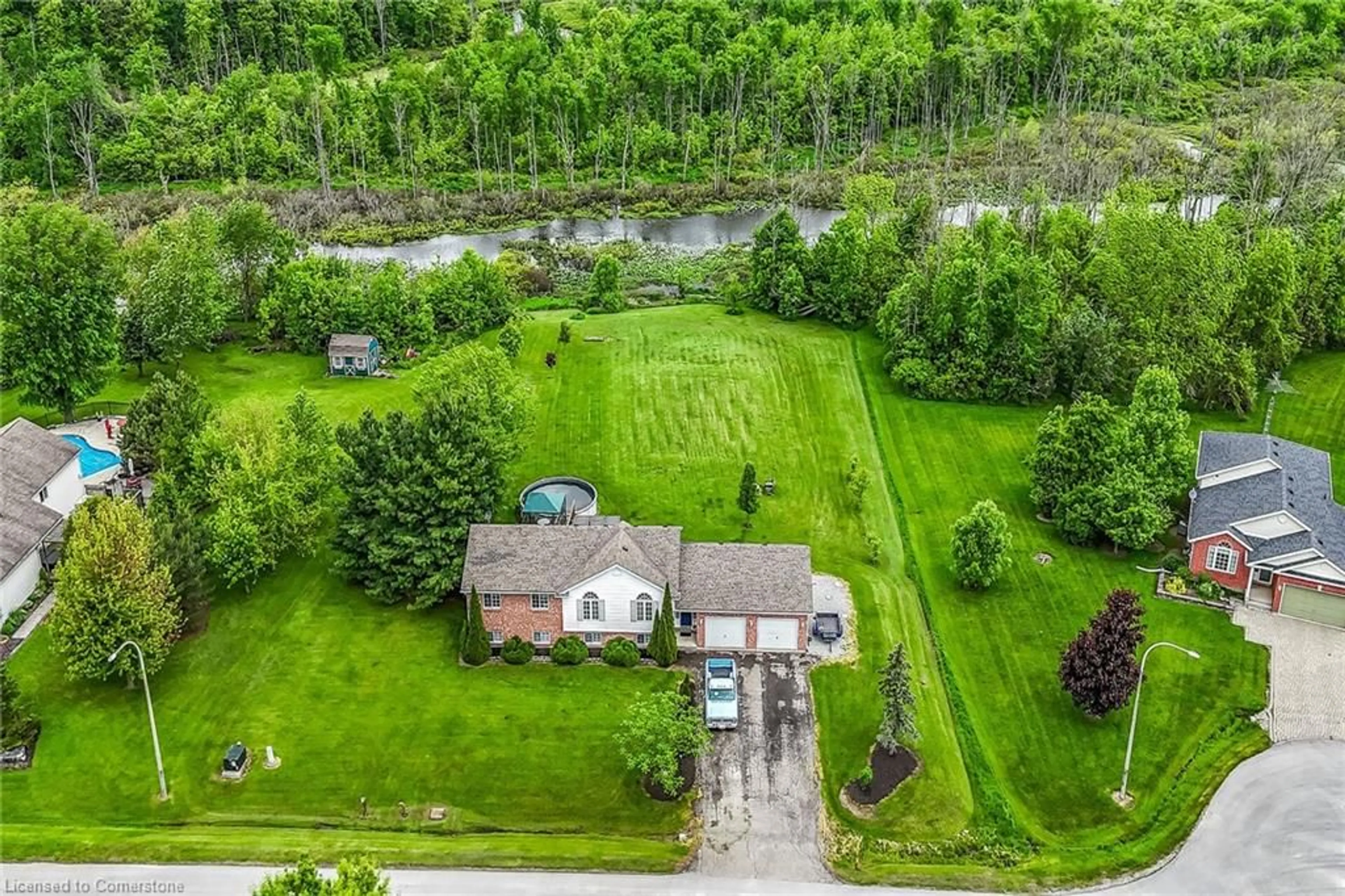 A pic from outside/outdoor area/front of a property/back of a property/a pic from drone, water/lake/river/ocean view for 5271 Beavercreek Cres, Wellandport Ontario L0R 2J0