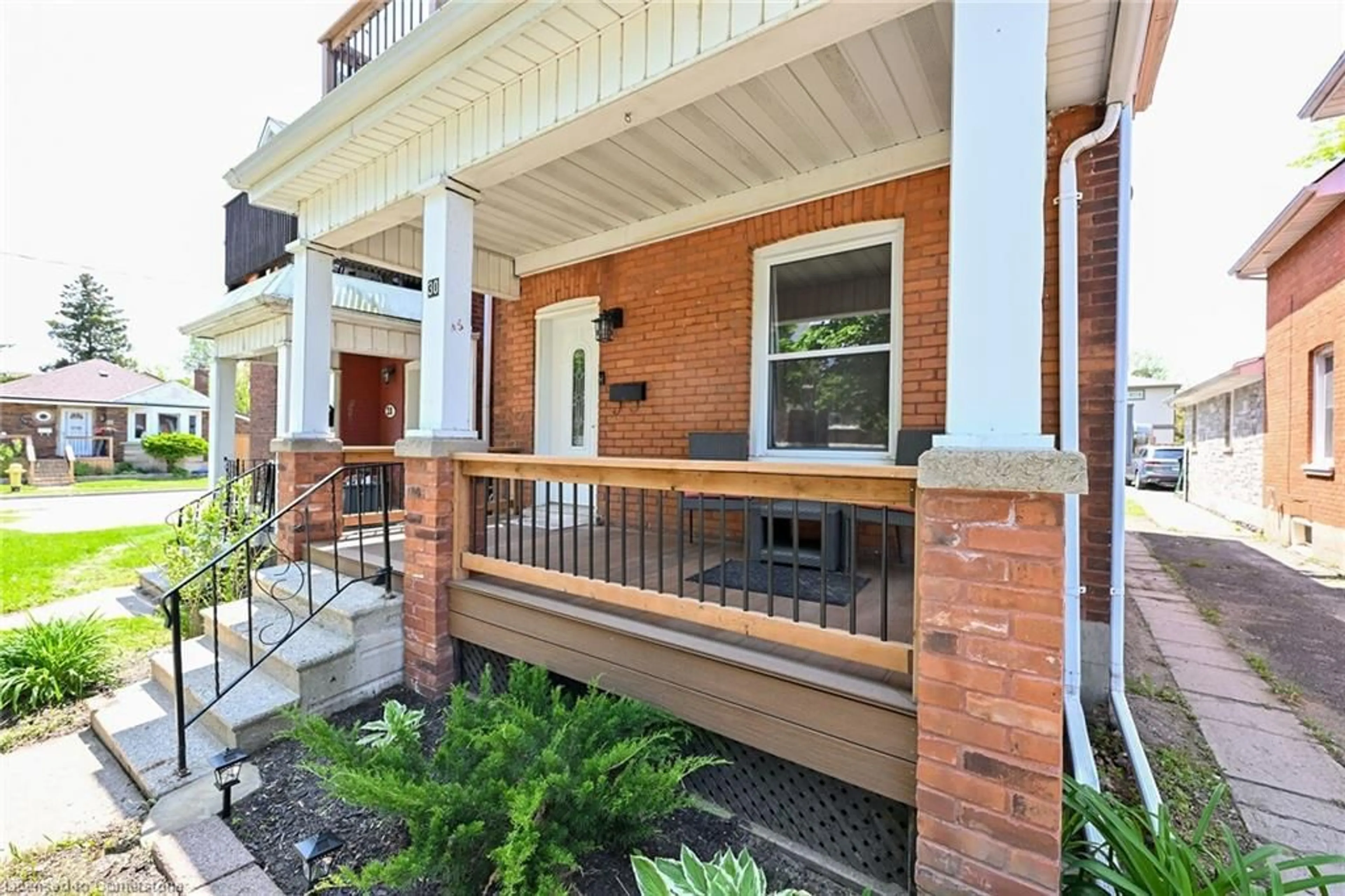 Home with brick exterior material, street for 30 Dundas St, Brantford Ontario N3R 1R9