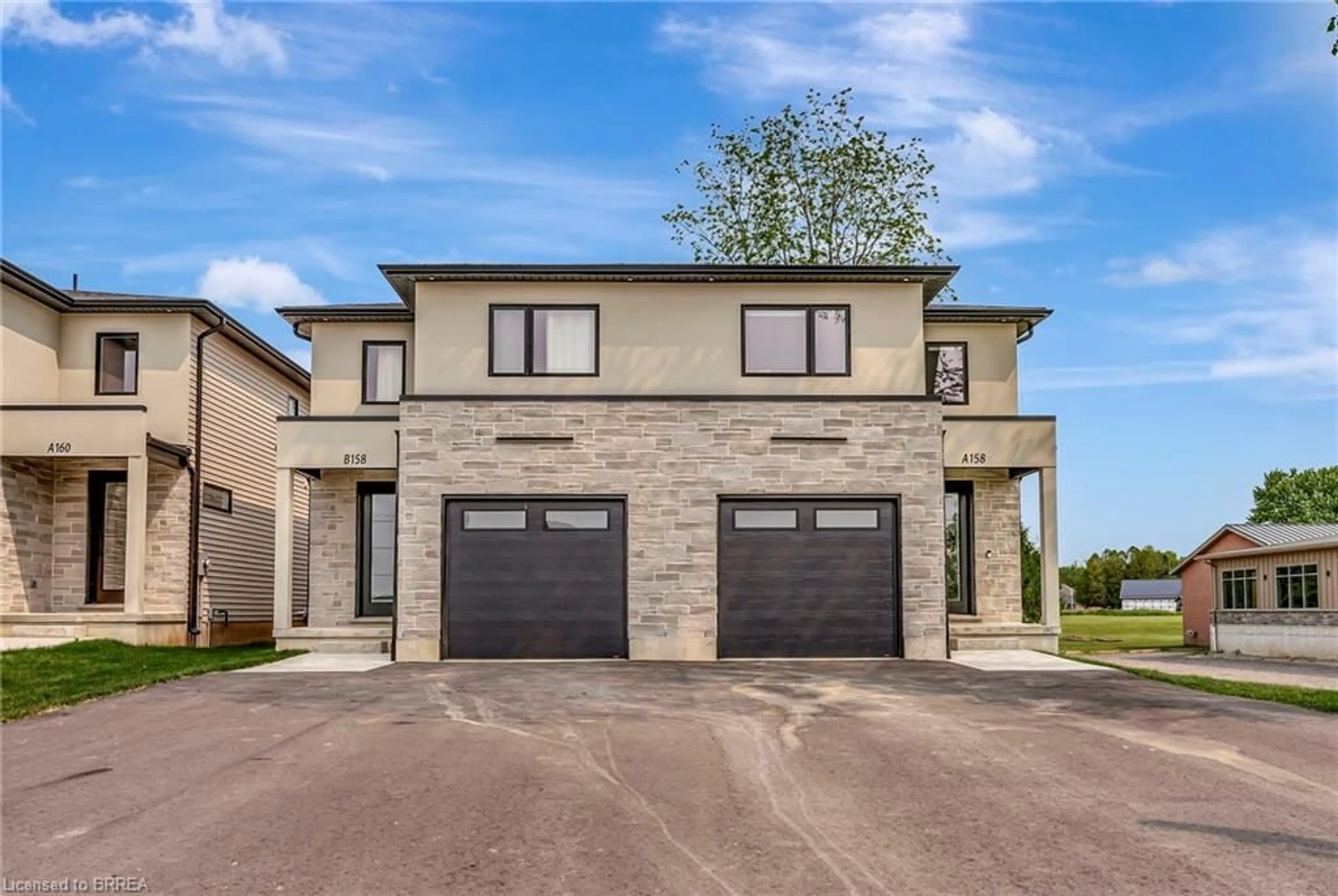 Home with brick exterior material, street for 158A Concession St, Tillsonburg Ontario N4G 4G8