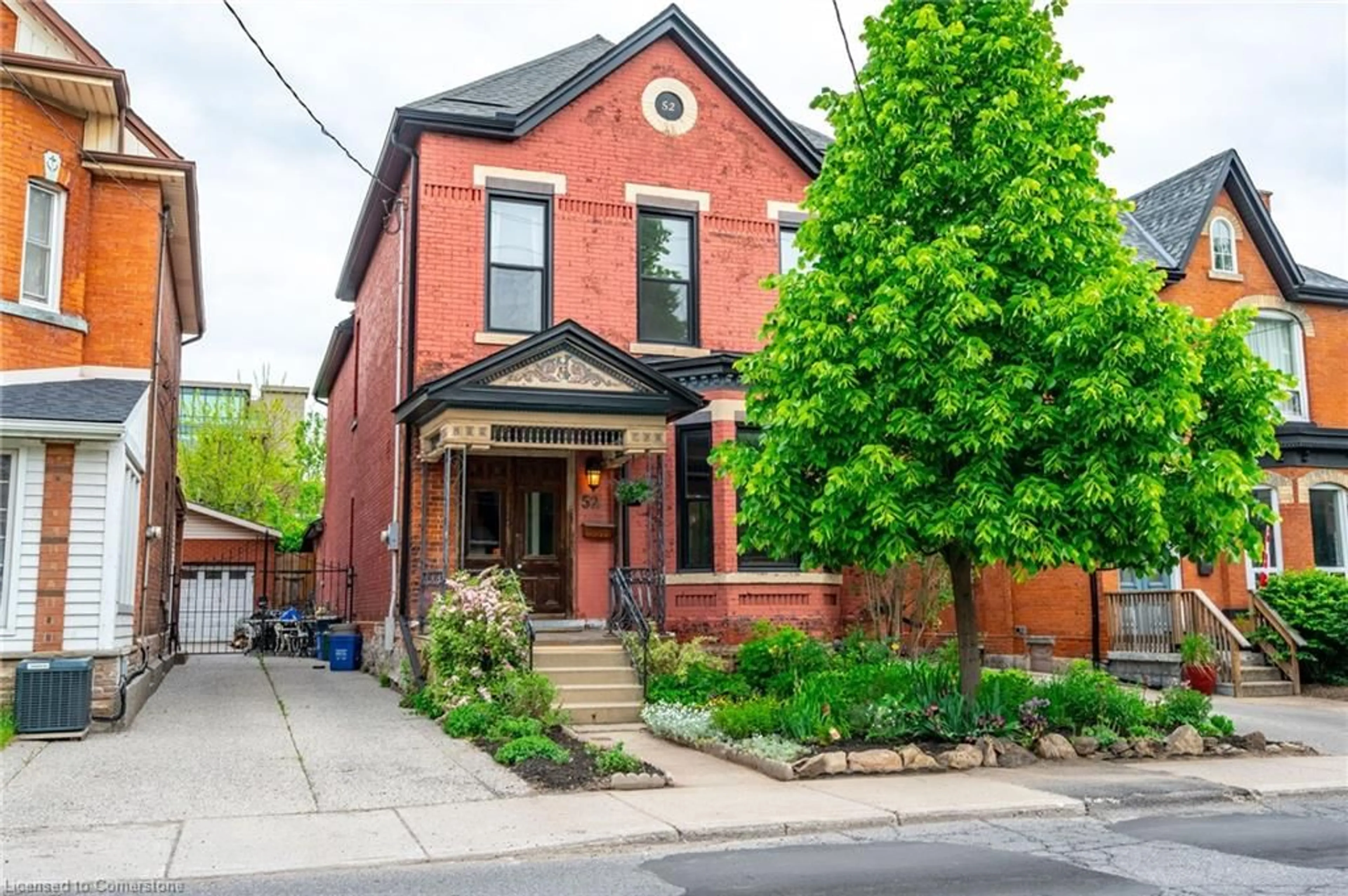 Home with brick exterior material, street for 52 Barton St, Hamilton Ontario L8L 1A4