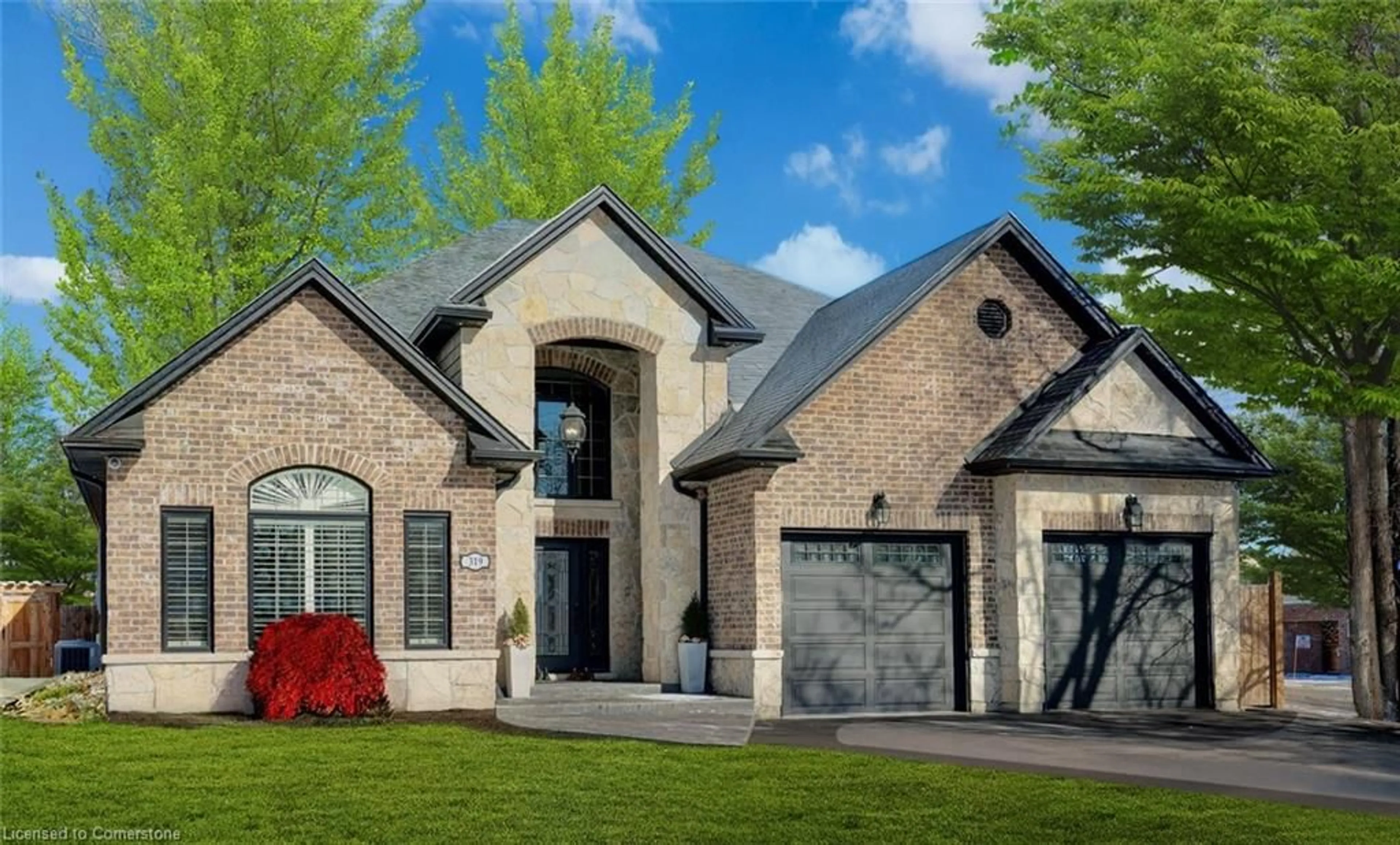 Home with brick exterior material, street for 319 Henderson Rd, Burlington Ontario L7L 2P6