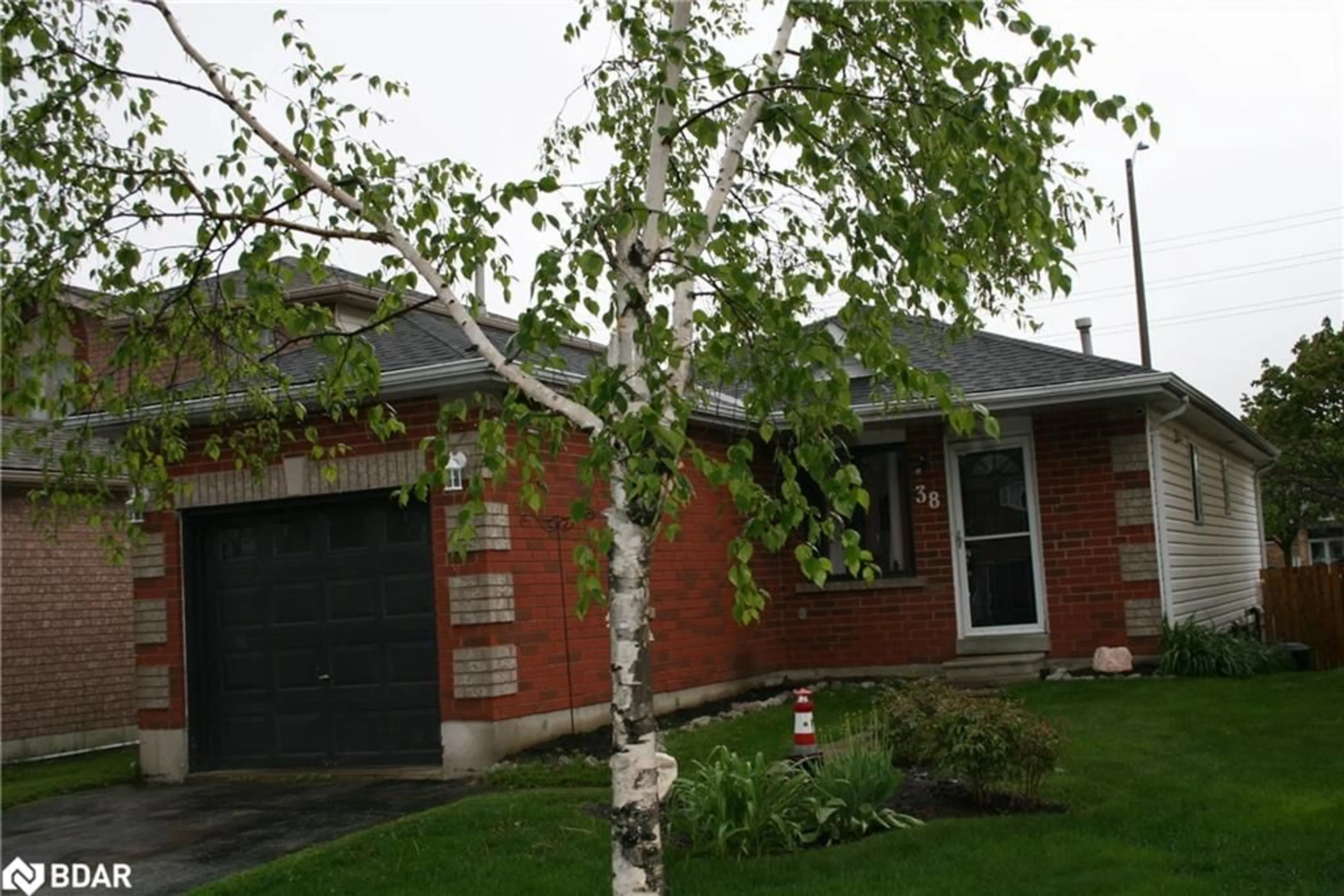Home with brick exterior material, street for 38 Garibaldi Dr, Barrie Ontario L4N 8C3