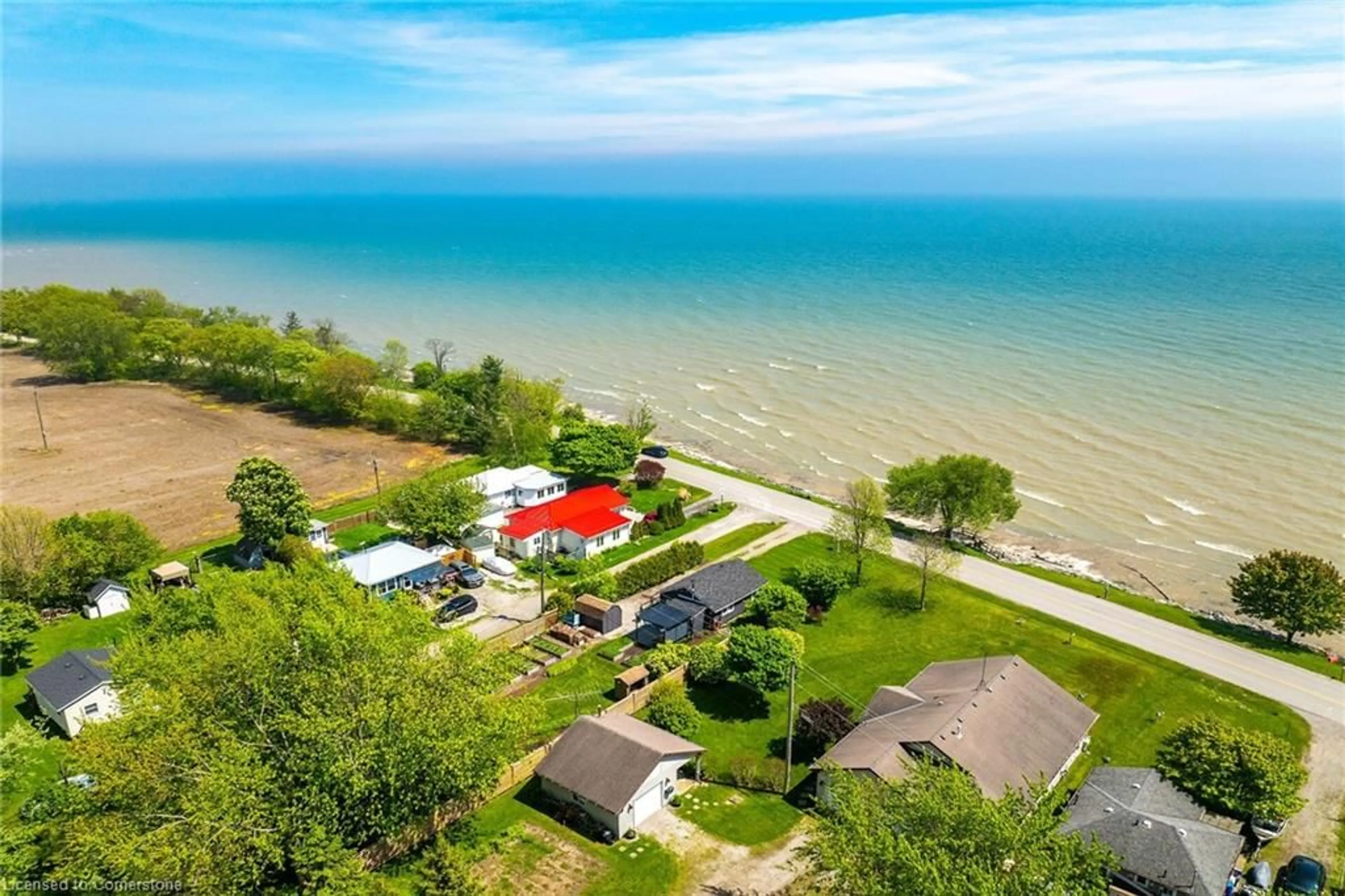 A pic from outside/outdoor area/front of a property/back of a property/a pic from drone, water/lake/river/ocean view for 39 Blue Water Pky, Selkirk Ontario N0A 1P0