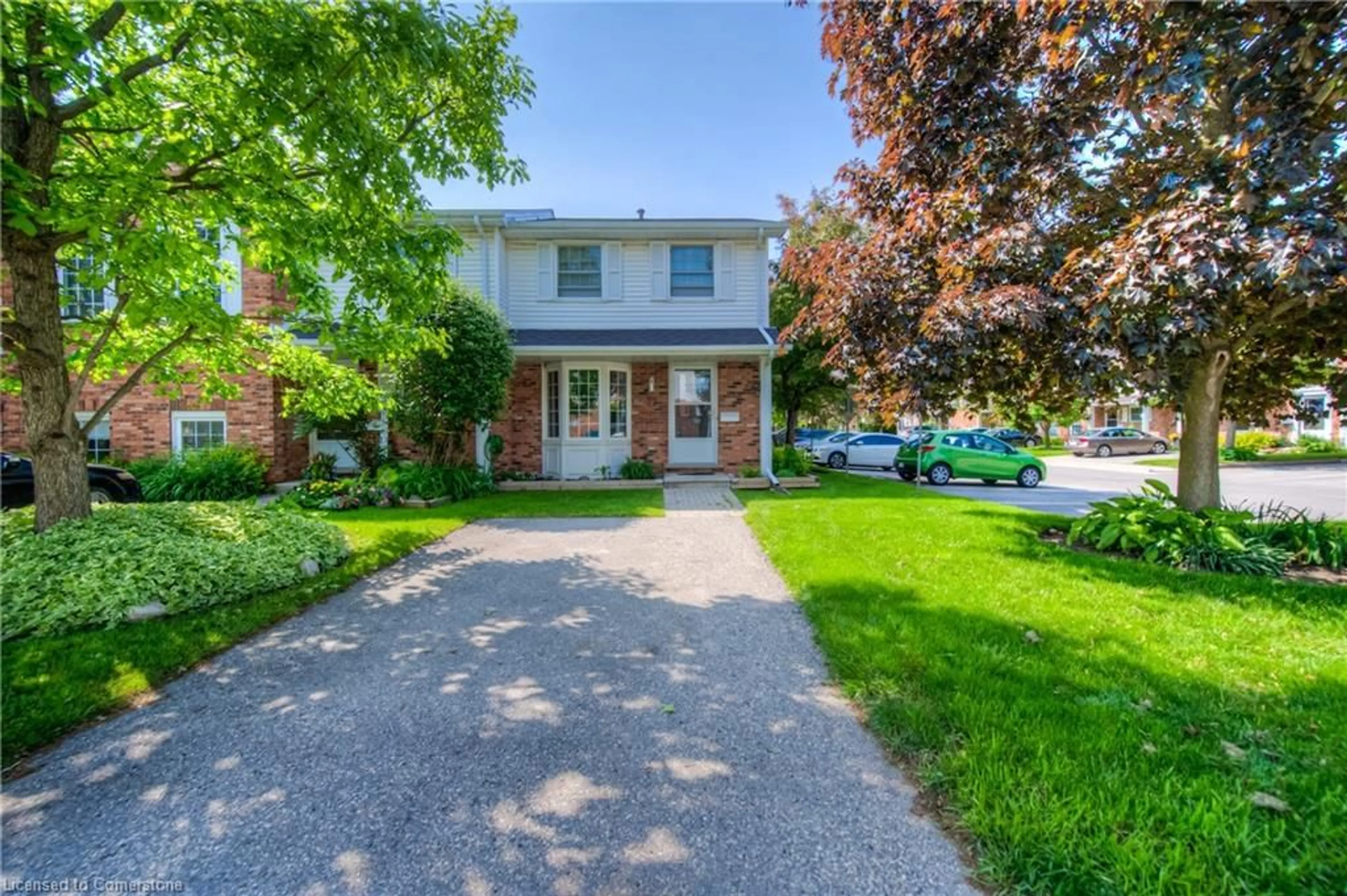 Home with brick exterior material, street for 129 Victoria Rd #72, Guelph Ontario N1E 6T8