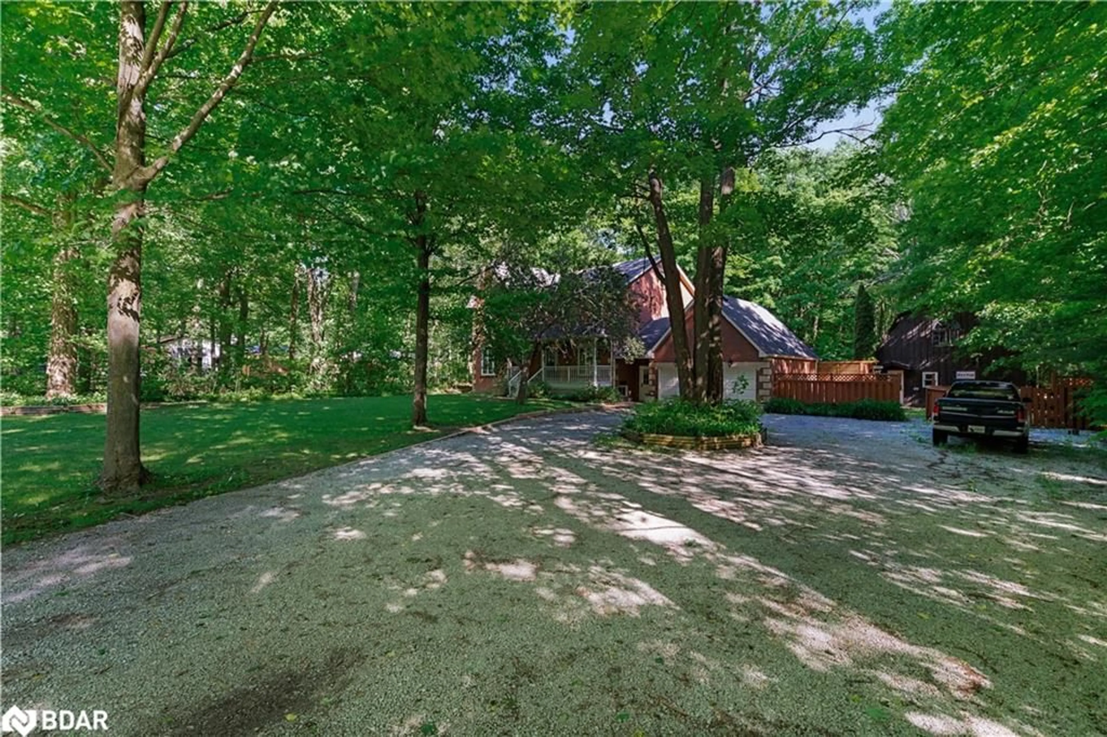 A pic from outside/outdoor area/front of a property/back of a property/a pic from drone, forest/trees view for 1311 Snow Valley Rd, Midhurst Ontario L9X 1K2