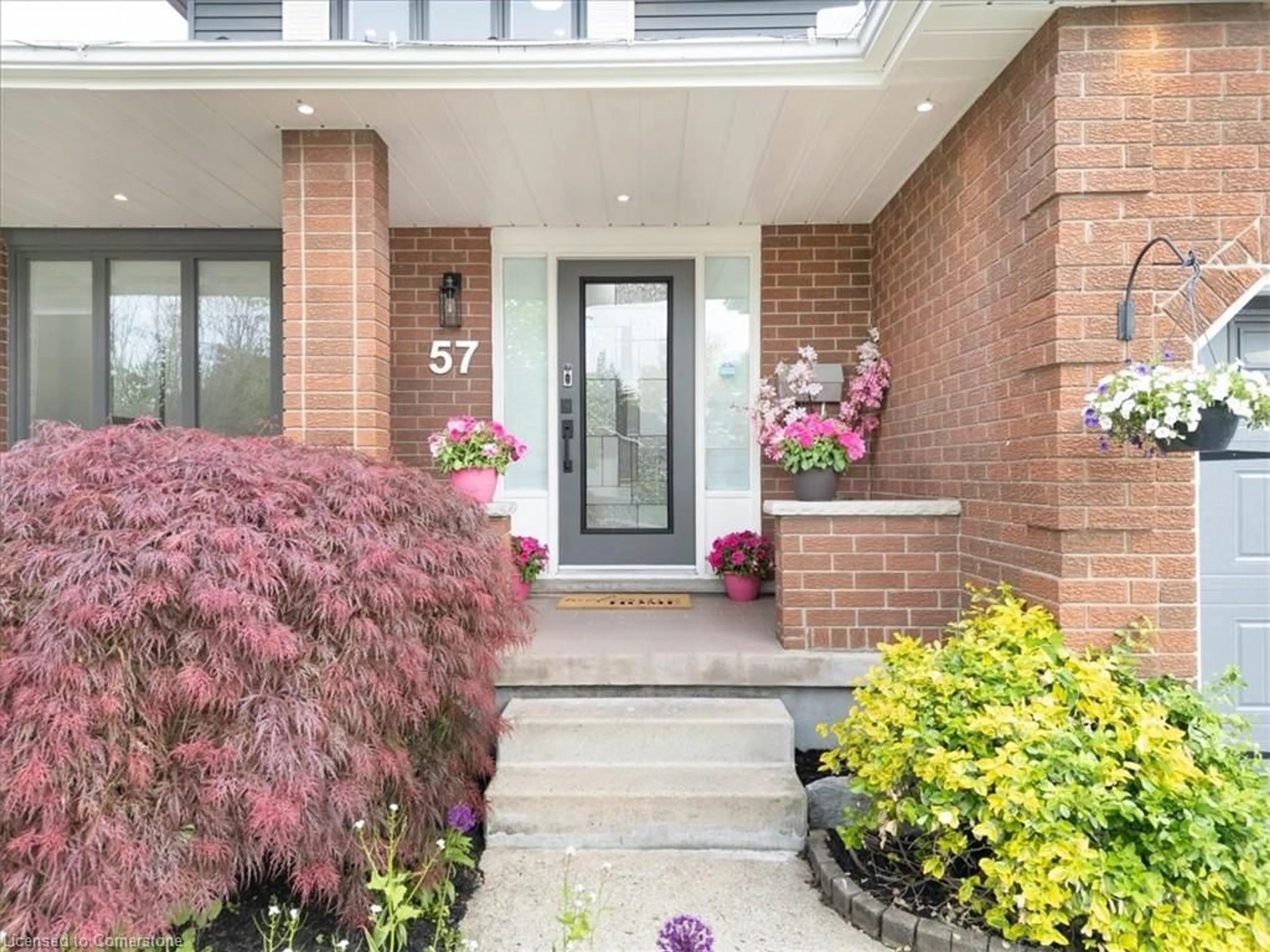Home with brick exterior material, street for 57 Springmount Dr, Kitchener Ontario N2A 3V2