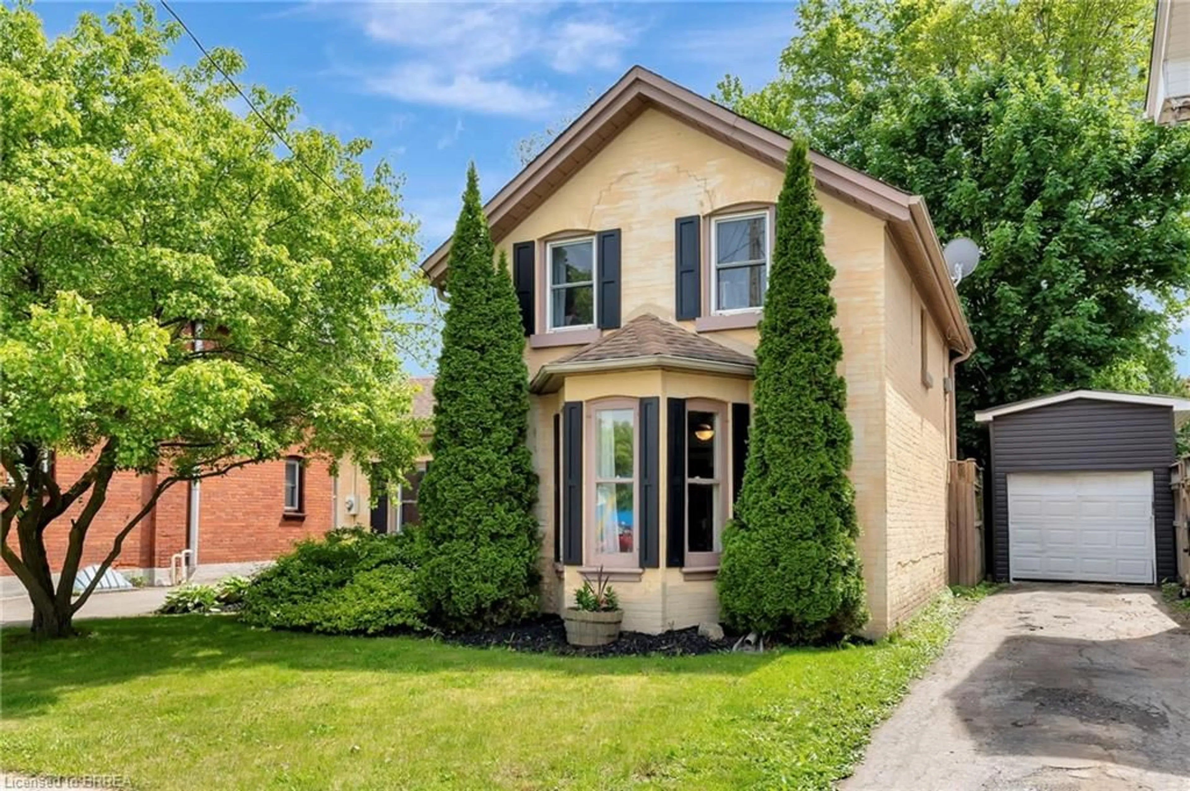 Home with brick exterior material, street for 4 Palmerston Ave, Brantford Ontario N3T 4K9