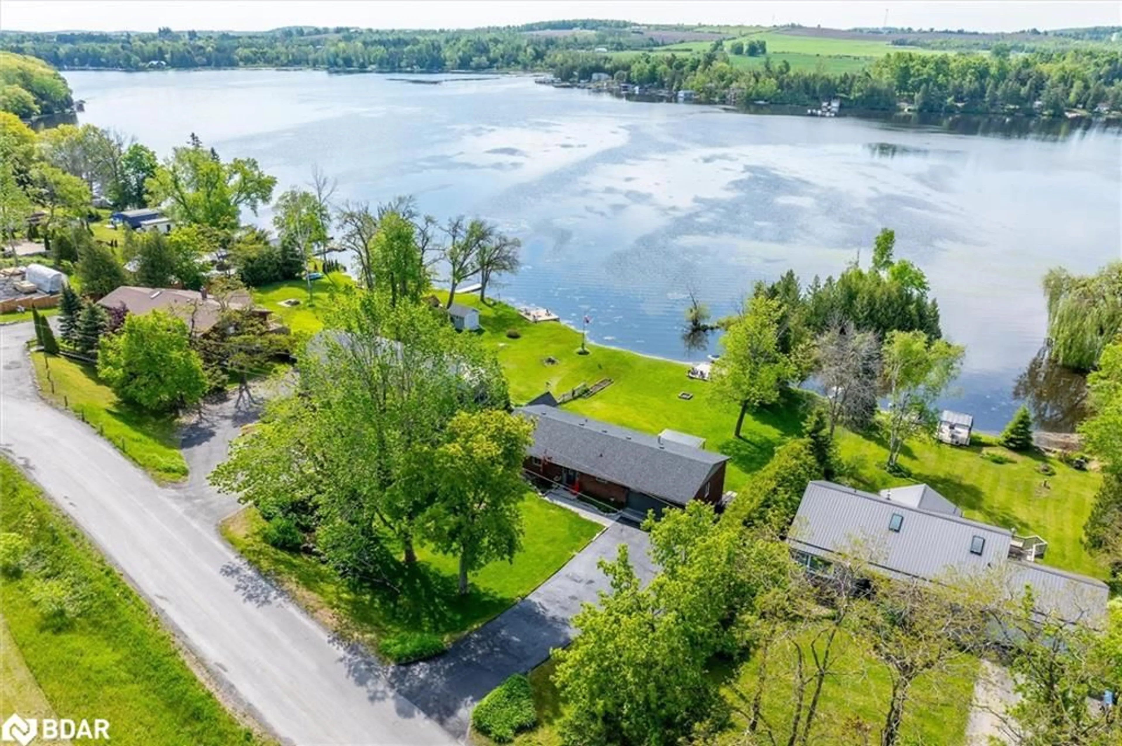A pic from outside/outdoor area/front of a property/back of a property/a pic from drone, water/lake/river/ocean view for 112 Clearview Dr, Omemee Ontario K0L 2W0