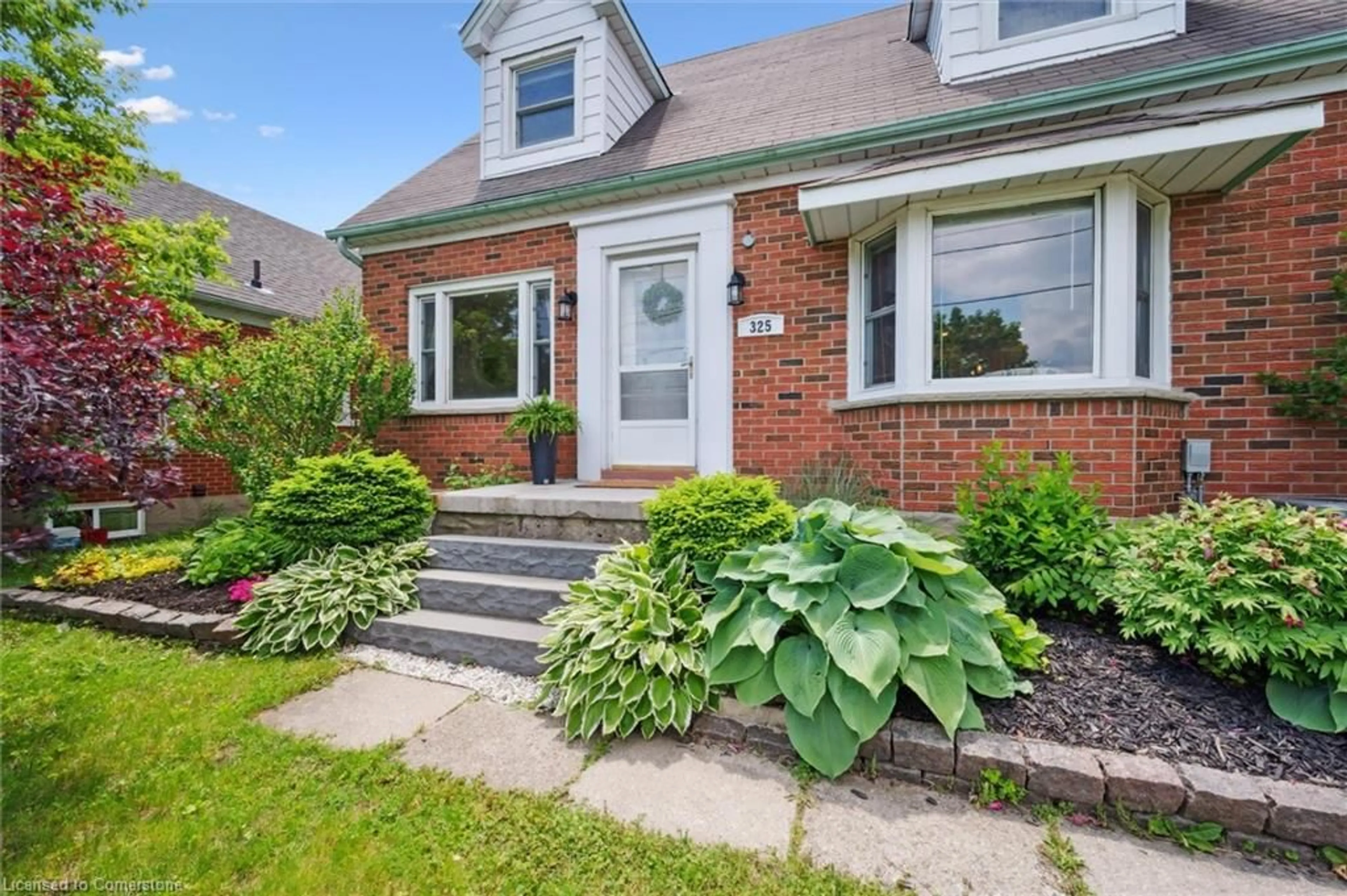 Home with brick exterior material, street for 325 Patricia Ave, Kitchener Ontario N2M 1K3