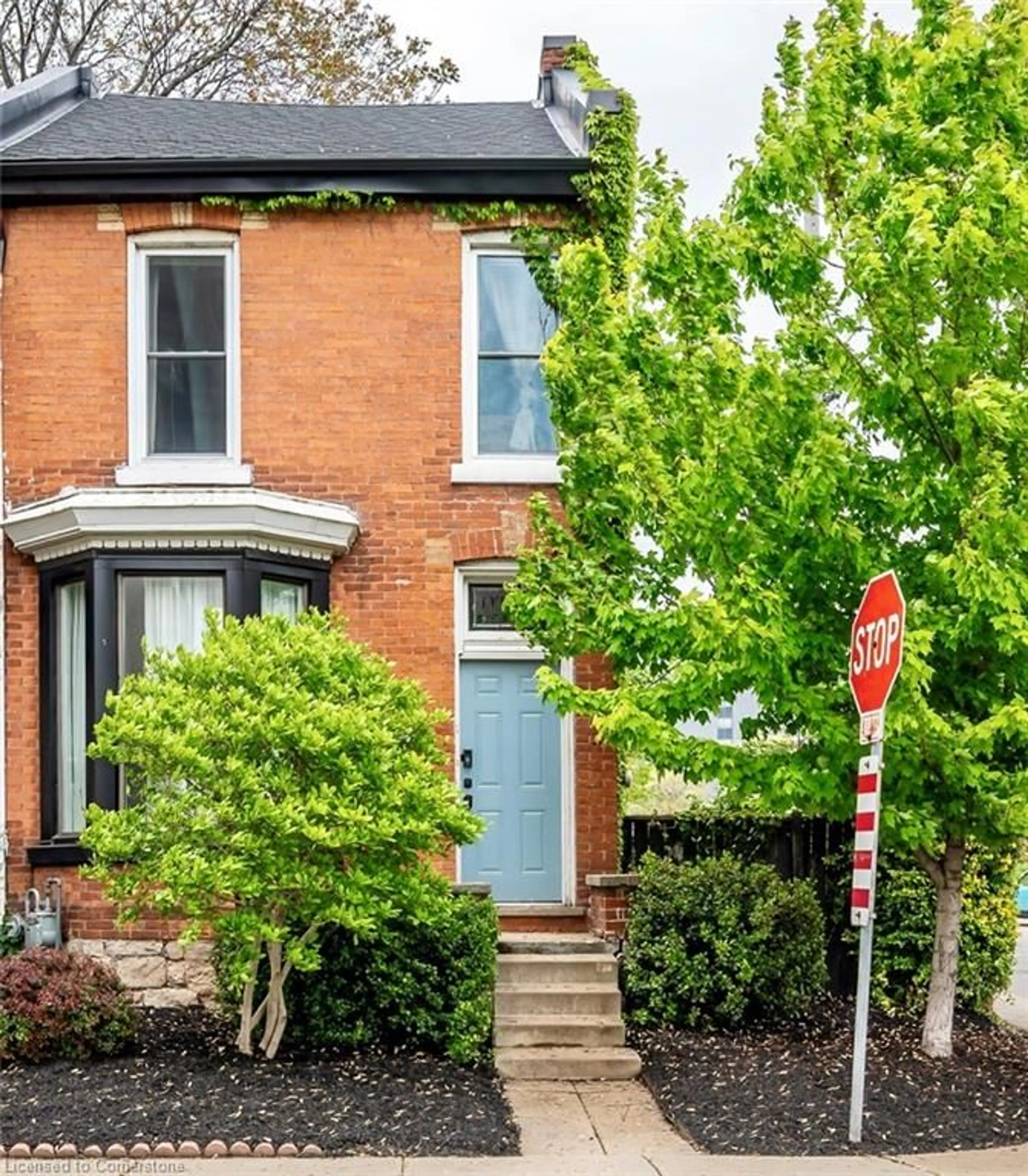 Home with brick exterior material, street for 29 Emerald St, Hamilton Ontario L8L 5J9