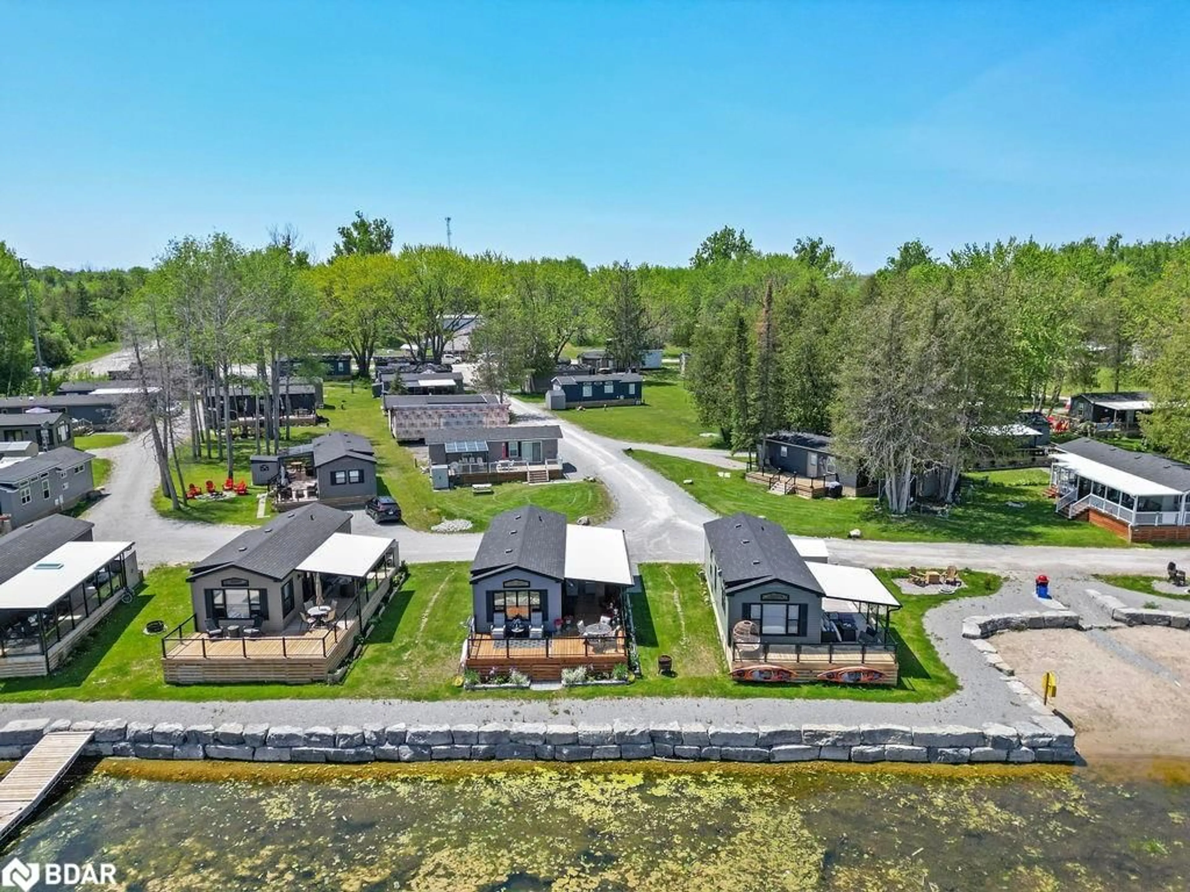 A pic from outside/outdoor area/front of a property/back of a property/a pic from drone, unknown for 657 Thunder Bridge Rd #W4, Lindsay Ontario K9V 4R1