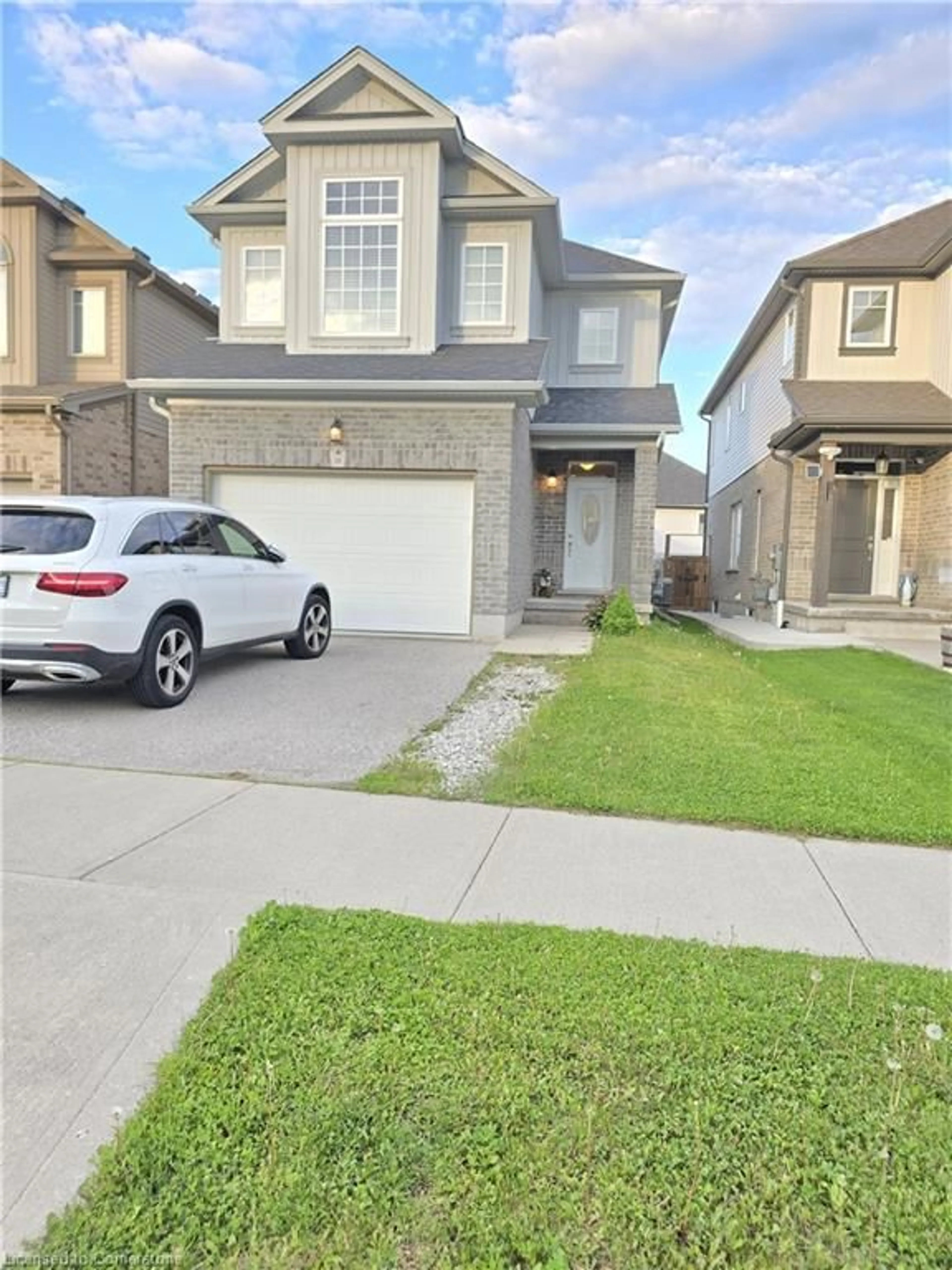 A pic from outside/outdoor area/front of a property/back of a property/a pic from drone, street for 18 Spring Creek St, Kitchener Ontario N2A 0G3