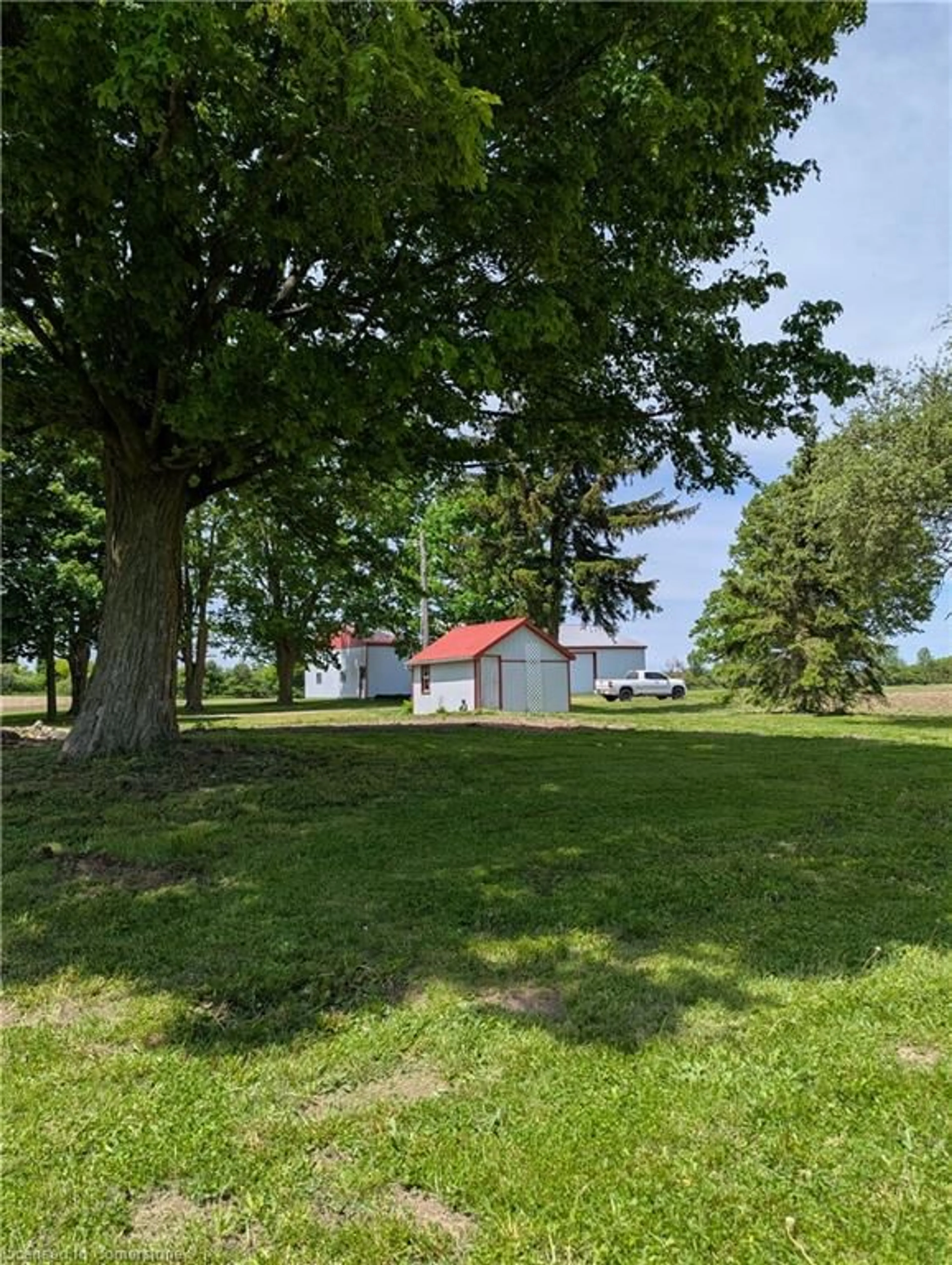 A pic from outside/outdoor area/front of a property/back of a property/a pic from drone, water/lake/river/ocean view for 6664 A Line 87 Line, Listowel Ontario N4W 3G6