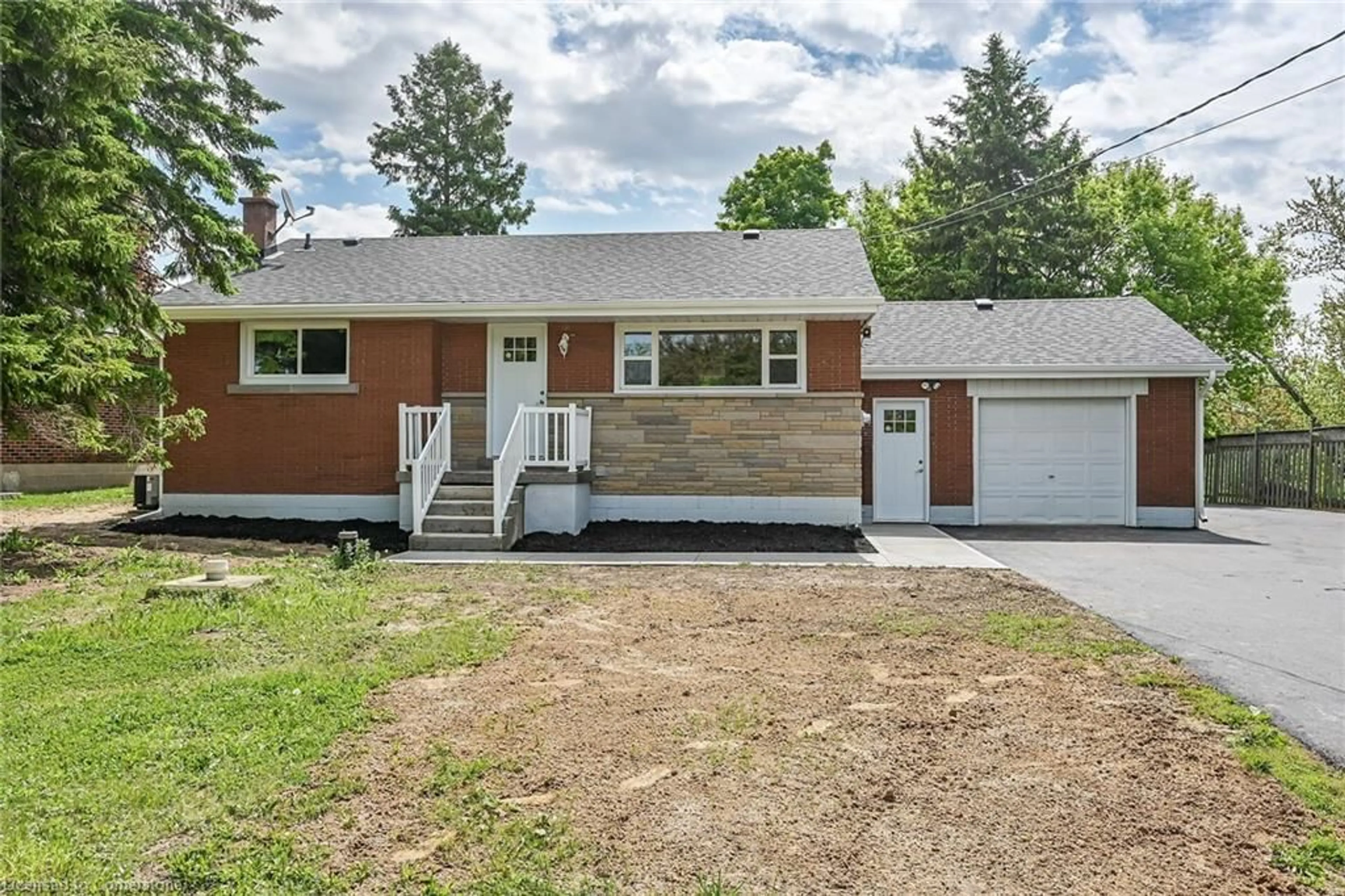 Home with vinyl exterior material, street for 1645 Glancaster Rd, Mount Hope Ontario L0R 1W0