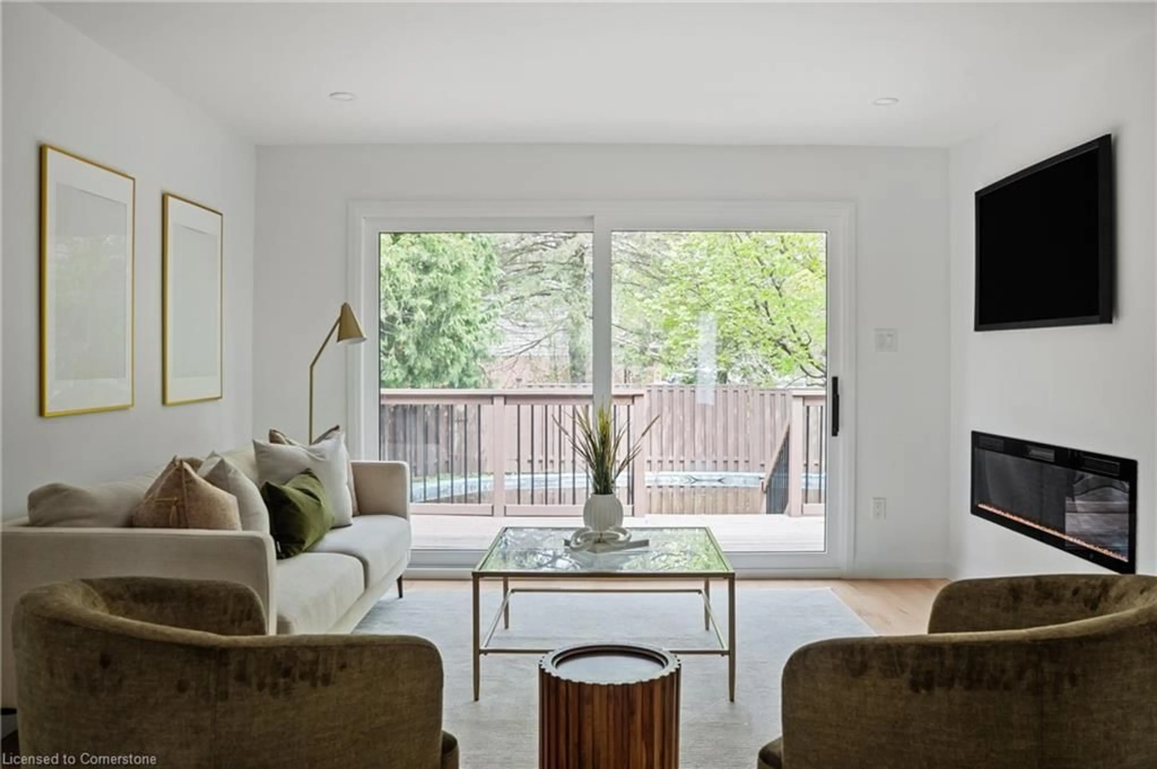 Living room with furniture, wood/laminate floor for 165 Victoria Rd, Guelph Ontario N1E 6J8