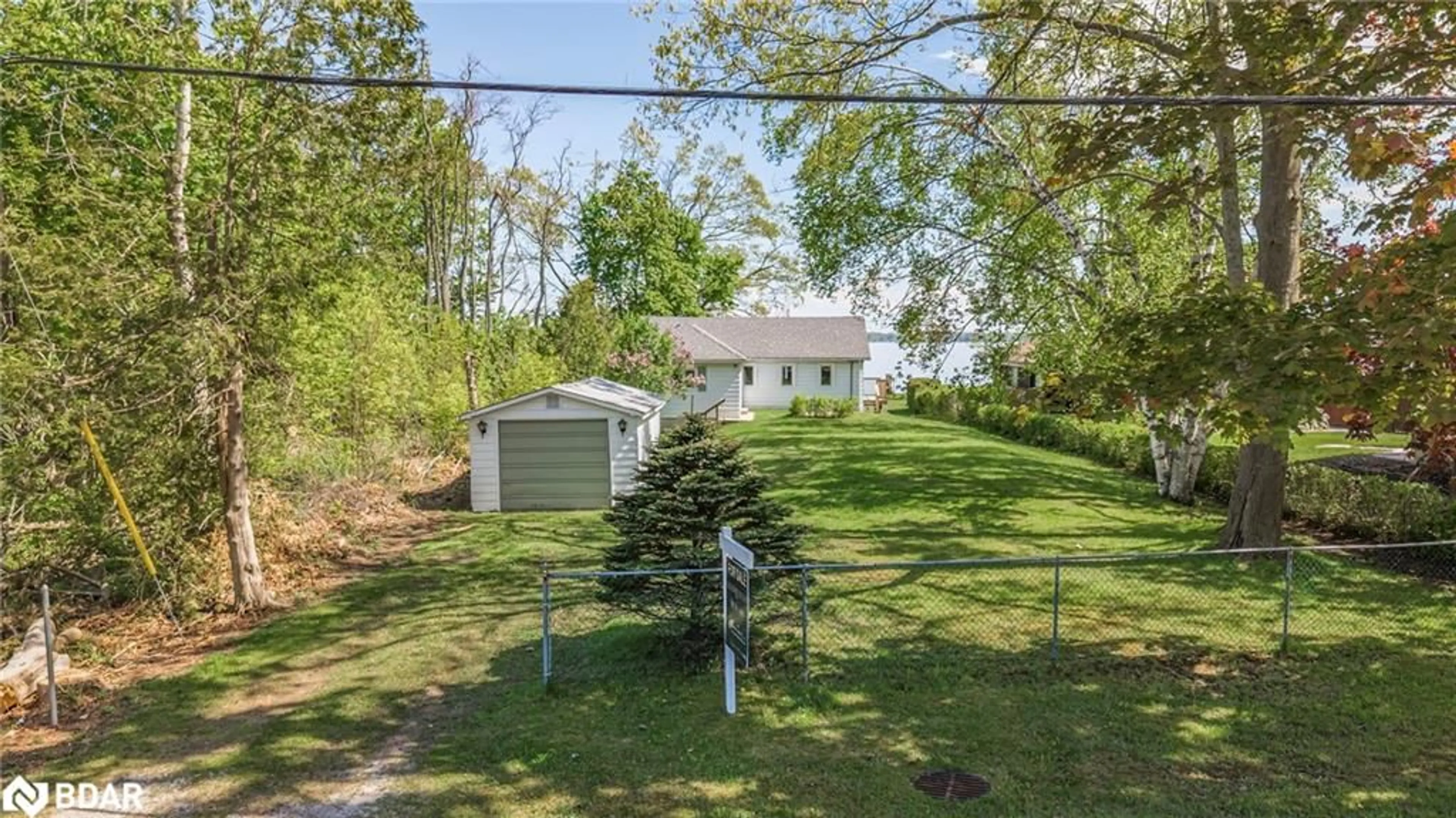 A pic from outside/outdoor area/front of a property/back of a property/a pic from drone, street for 1 Greenwood Forest Rd, Oro-Medonte Ontario L0L 2E0