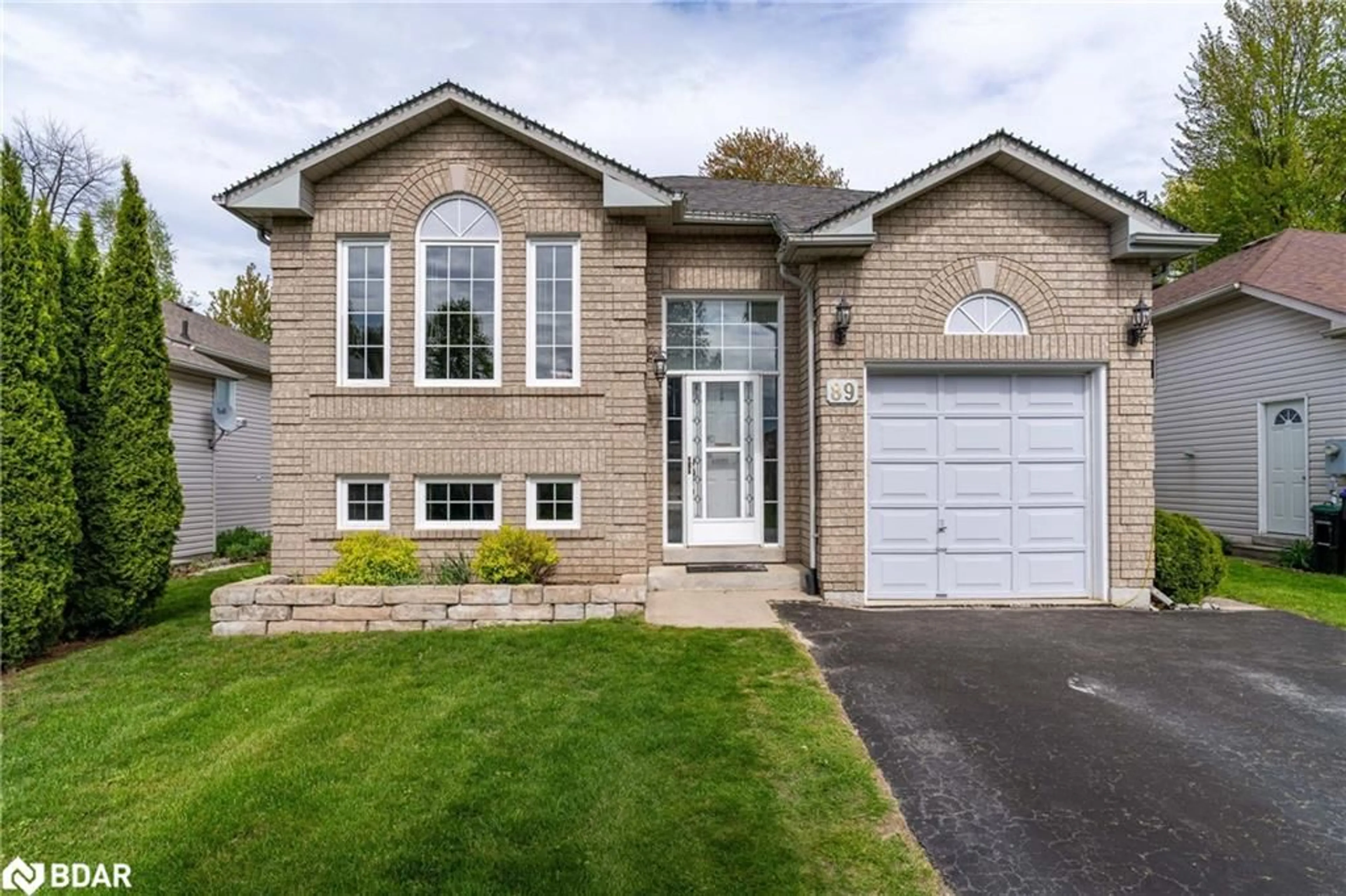Home with brick exterior material, street for 89 Glen Eton Rd, Wasaga Beach Ontario L9Z 1E8
